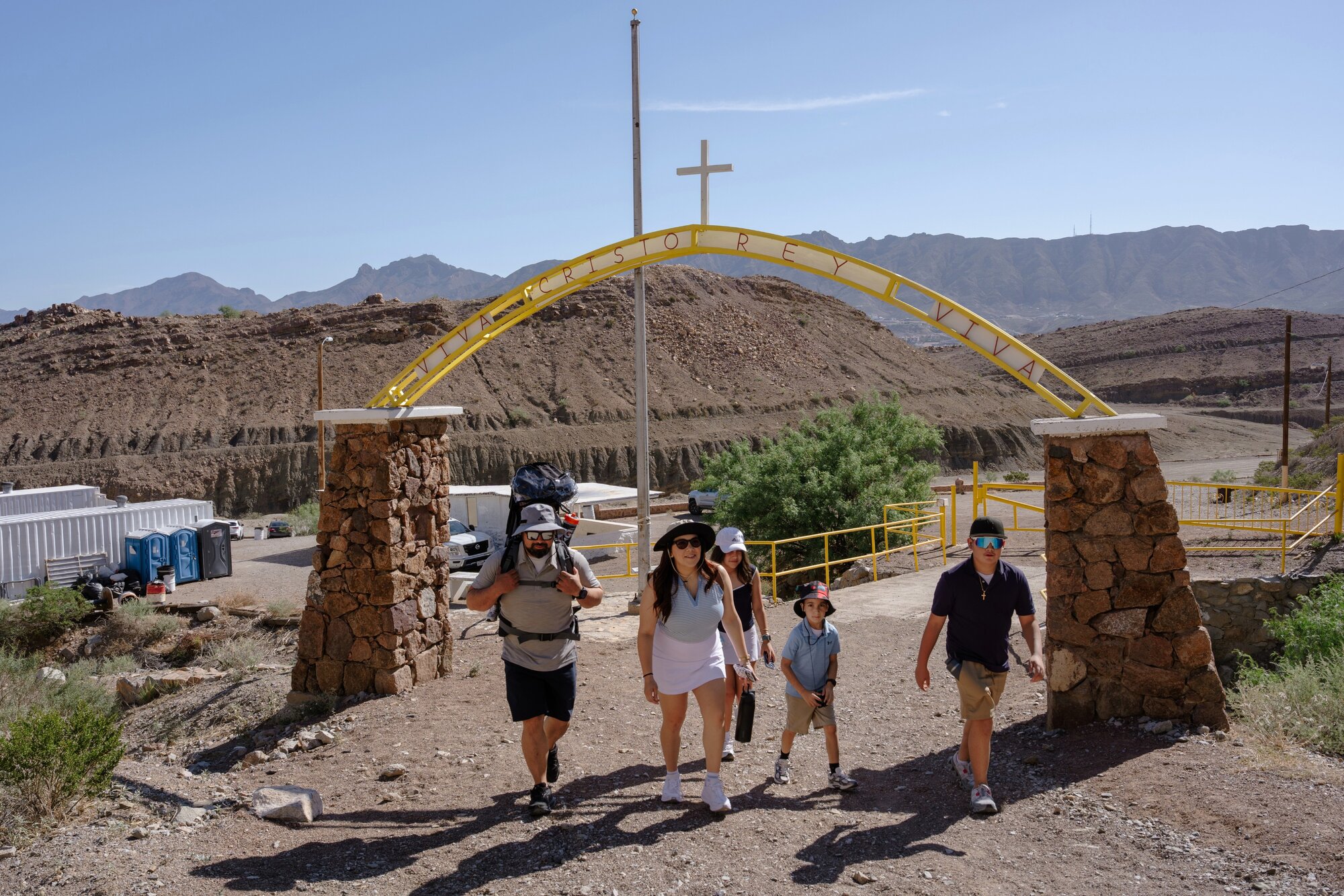 A family beginning their hike up Mount Cristo Rey in Sunland Park, New Mexico/ Photo / Paul Ratje, The New York Times