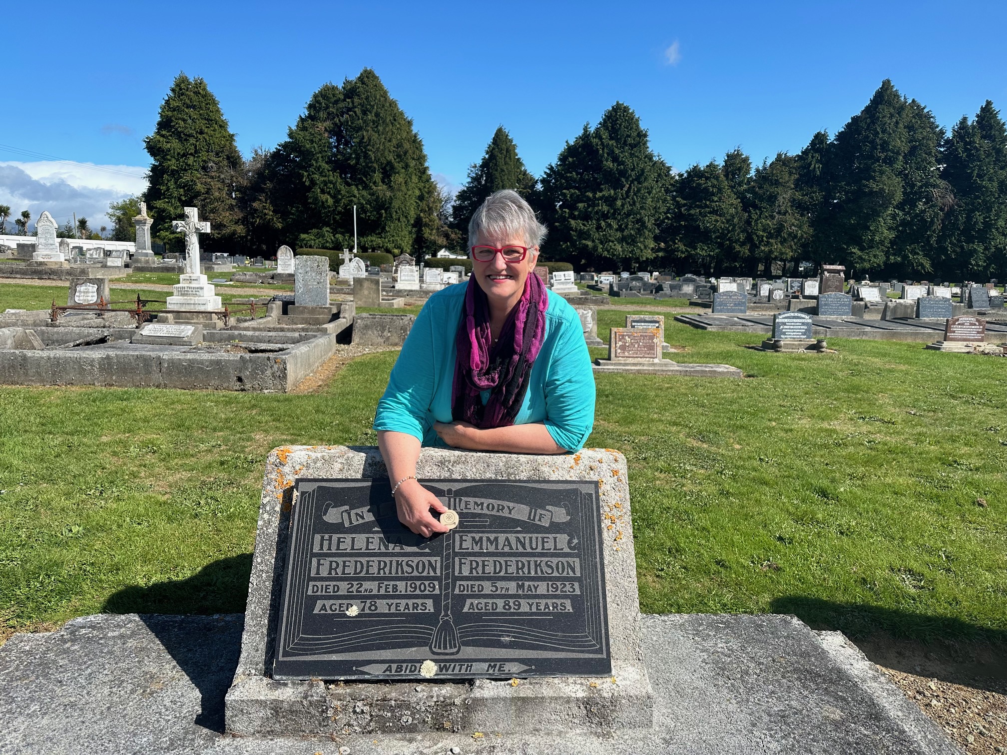 Judith Farley visits her ancestors at the Norsewood Cemetery with a 'Scandi Disk' she made.
