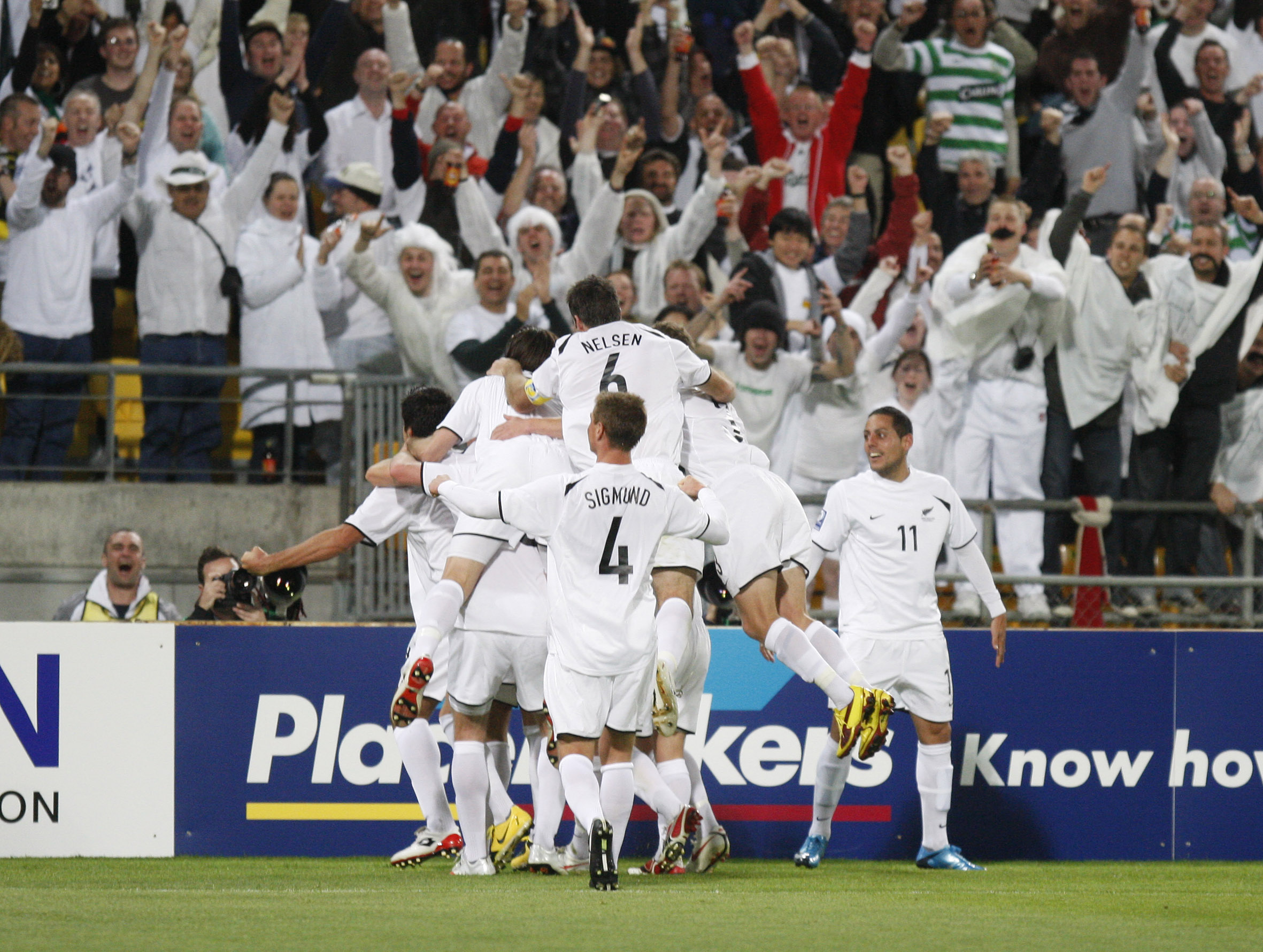The All Whites celebrate Rory Fallon's goal. Photo / Mark Mitchell