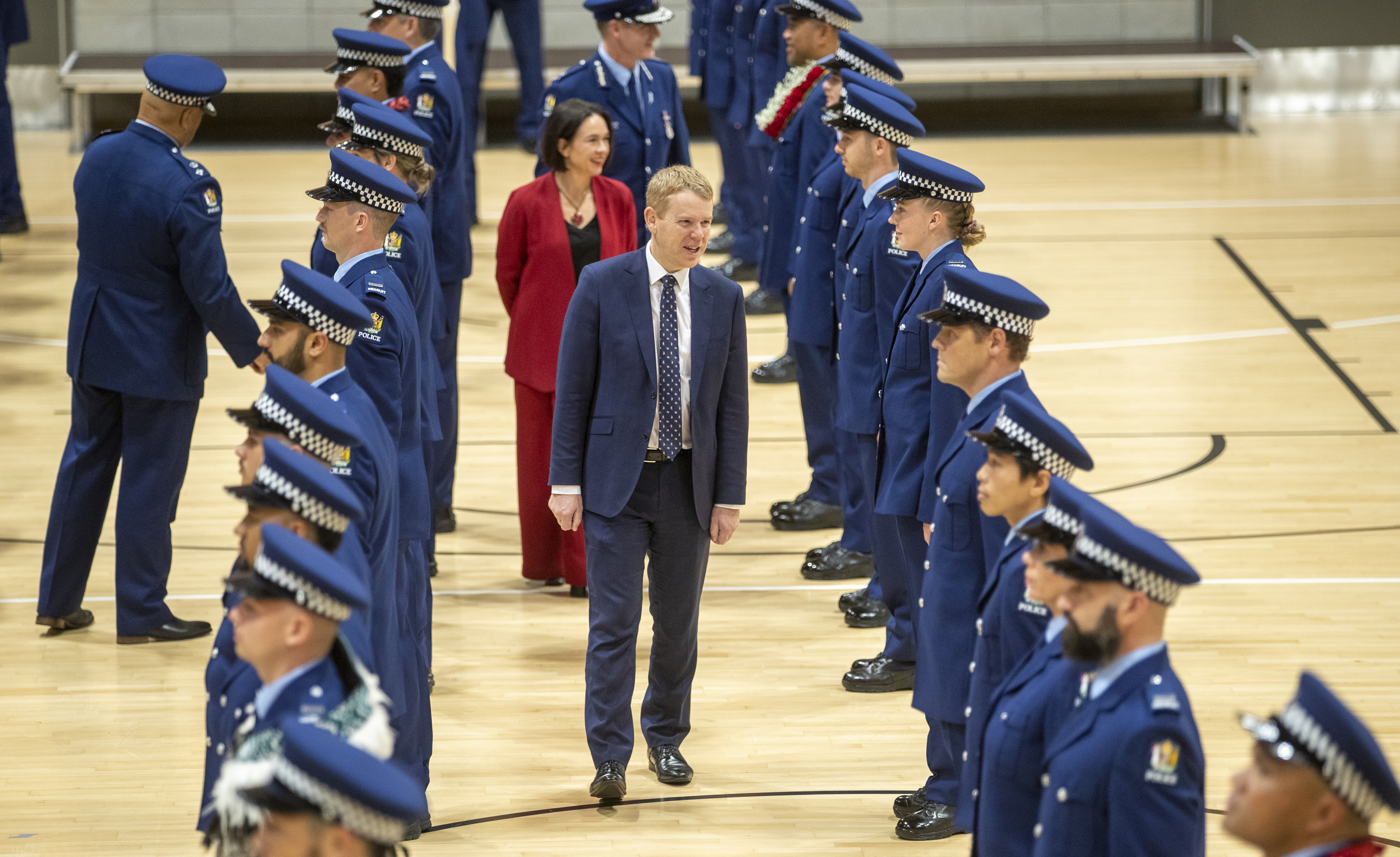 Prime Minister Chris Hipkins with Police Minister Ginny Andersen and Police Commissioner Andrew Coster during a graduation ceremony marking 1800 new police officers under Labour. Photo / Mark Mitchell
