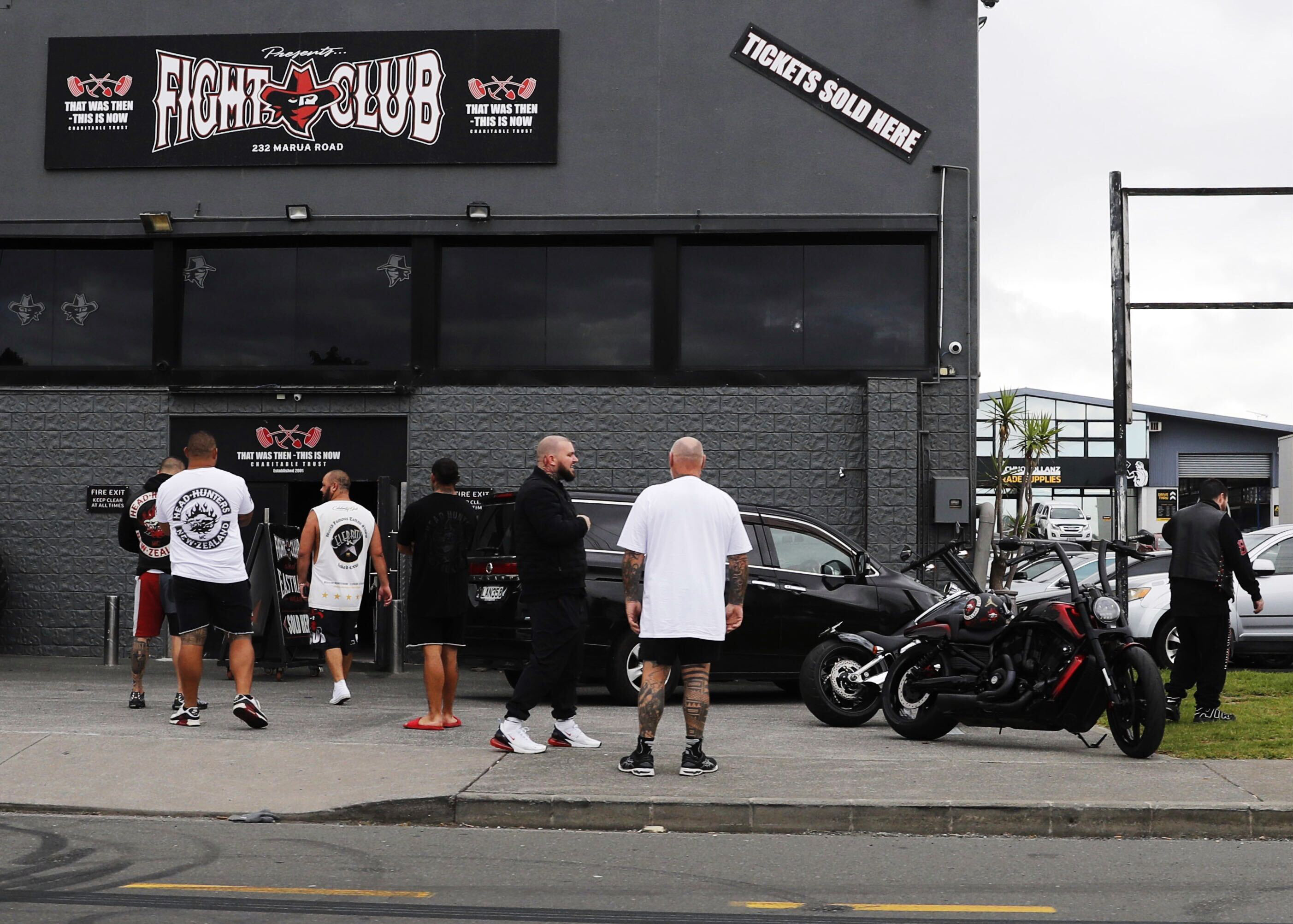 Members of the Head Hunters gather outside after shots were fired at their headquarters at 232 Marua Rd, Mt Wellington.  Photo / Dean Purcell
