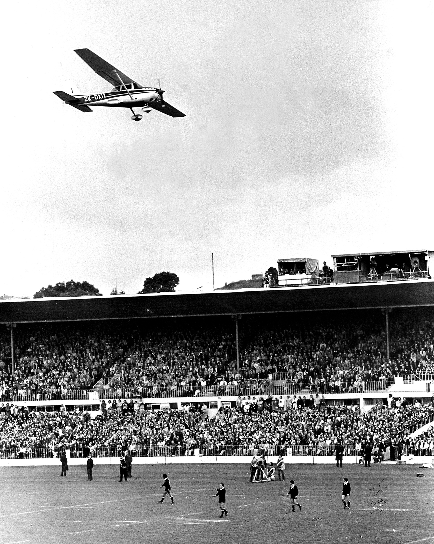 Marx Jones flies a Cessna aircraft low over Eden Park in an attempt to stop the third and final All Blacks-Springboks test match in 1981. Photo / Herald archive