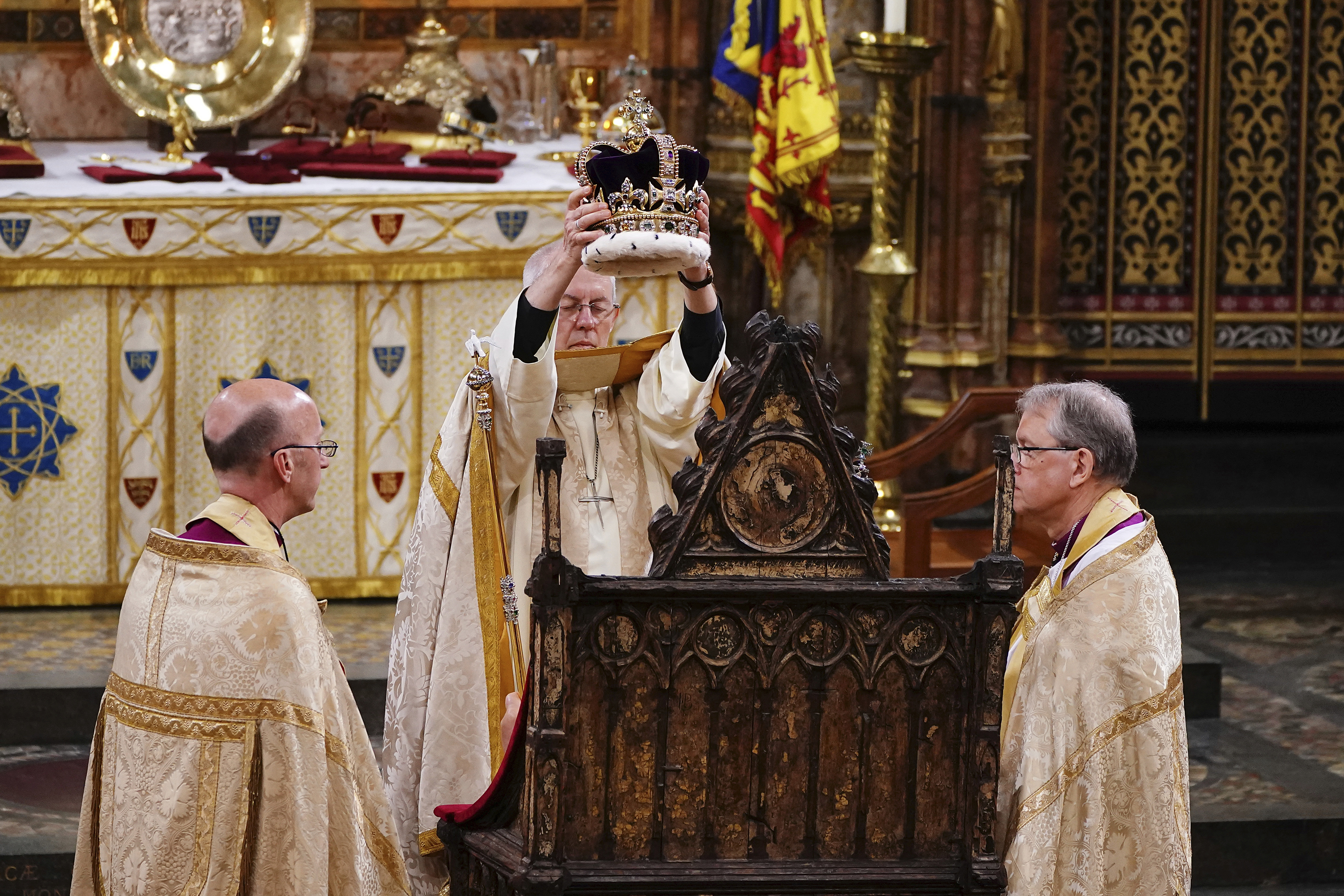King Charles III is crowned with St Edward's Crown by The Archbishop of Canterbury the Most Reverend Justin Welby, during his coronation ceremony  in Westminster Abbey. Photo / AP