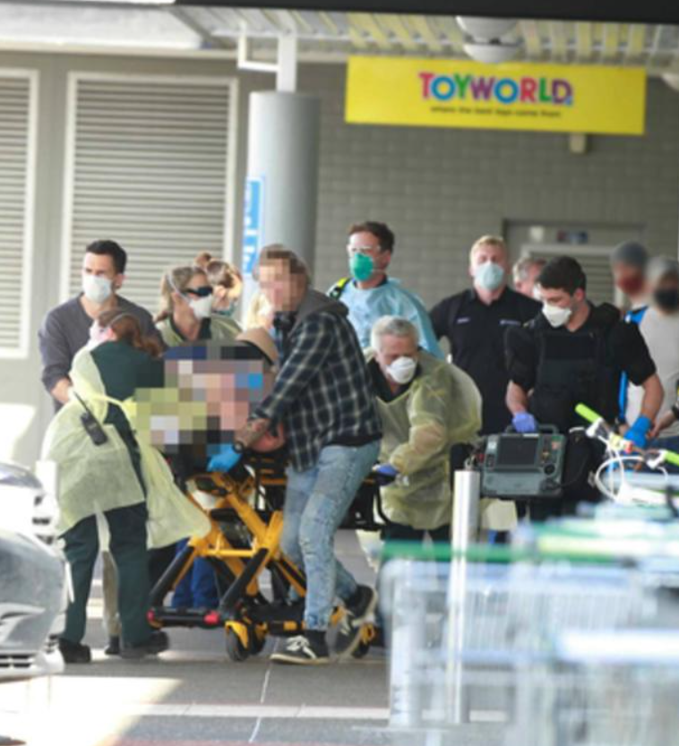 Police and the ambulance at the New Lynn Countdown after a terrorist attack in which six people were stabbed. Photo / Alex Burton