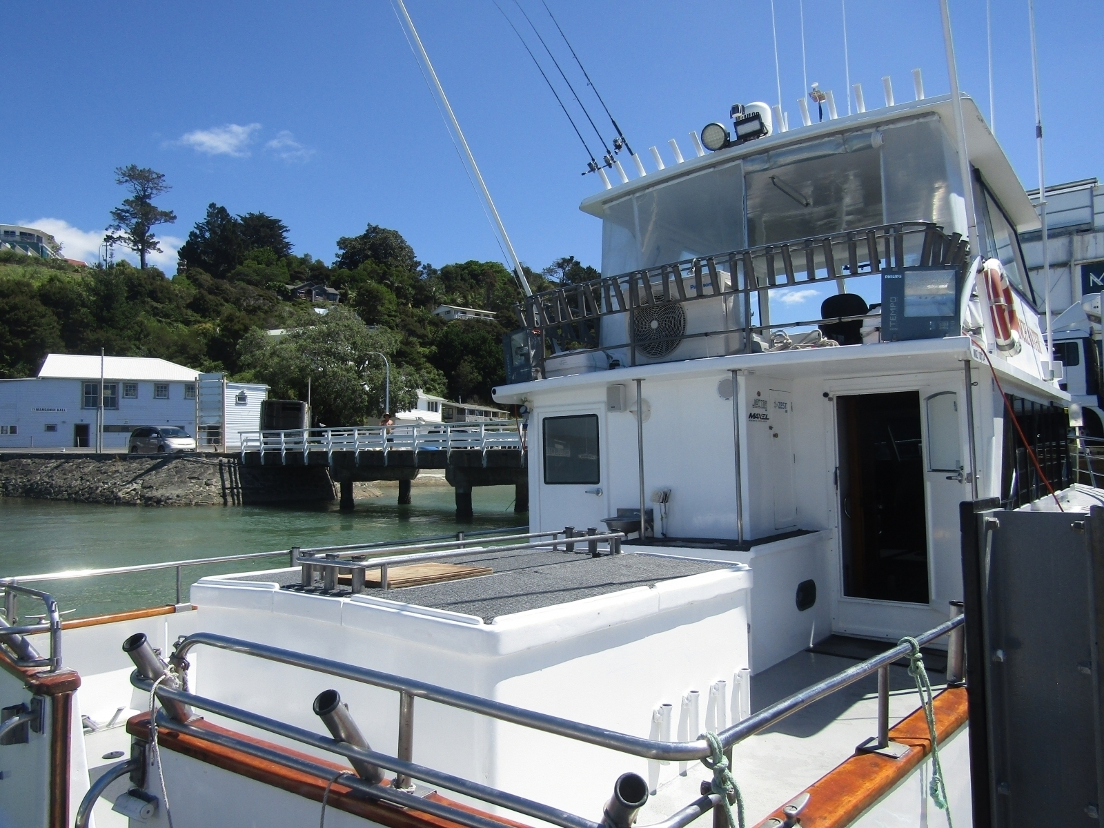 The Enchanter in its former glory, before ferocious weather ripped the boat's bridge from its hull. Photo / Enchanter.co.nz