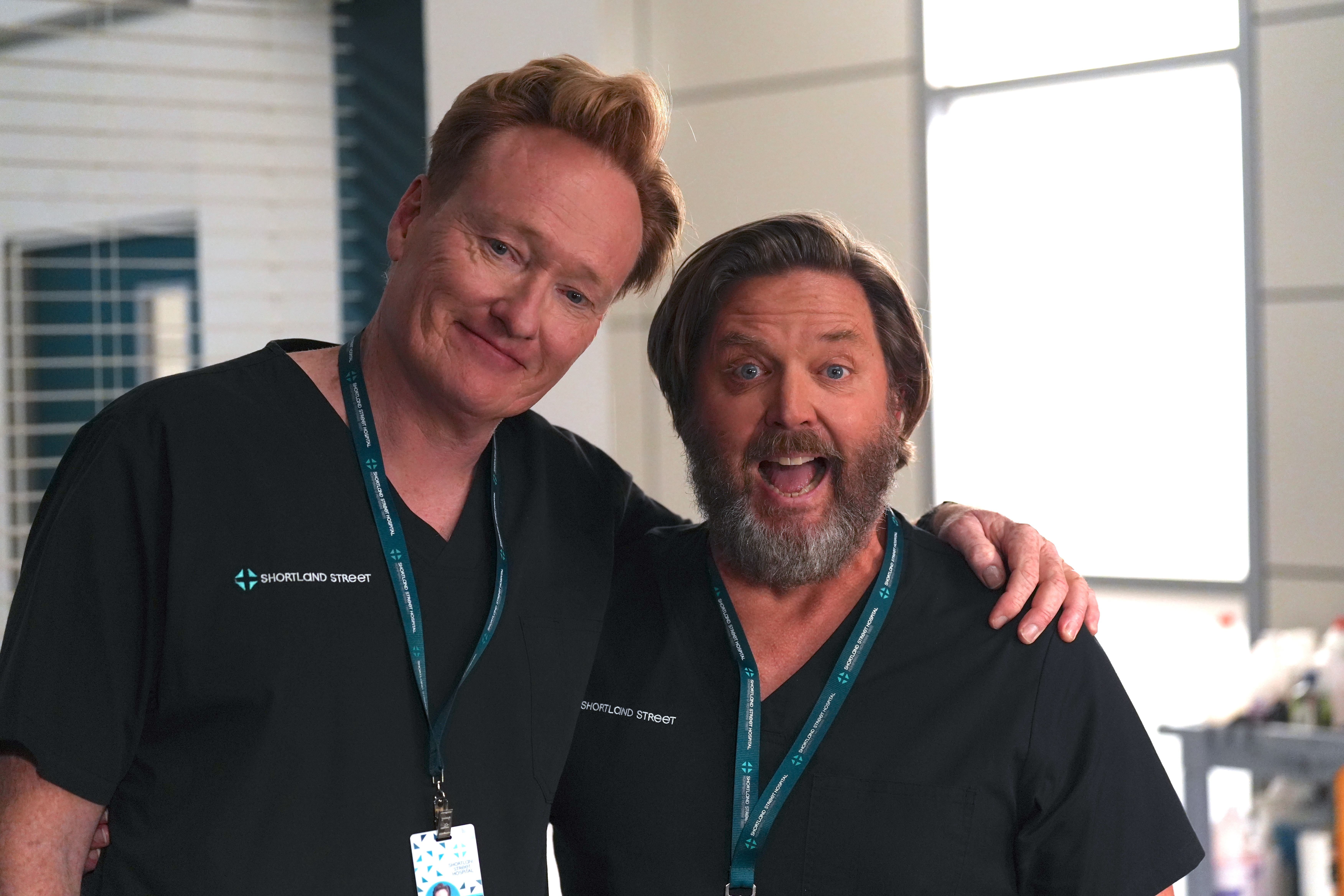 US comedian Conan O'Brien with actor Michael Galvin (Dr Chris Warner) on the set of Shortland Street. Photo / South Pacific Picture