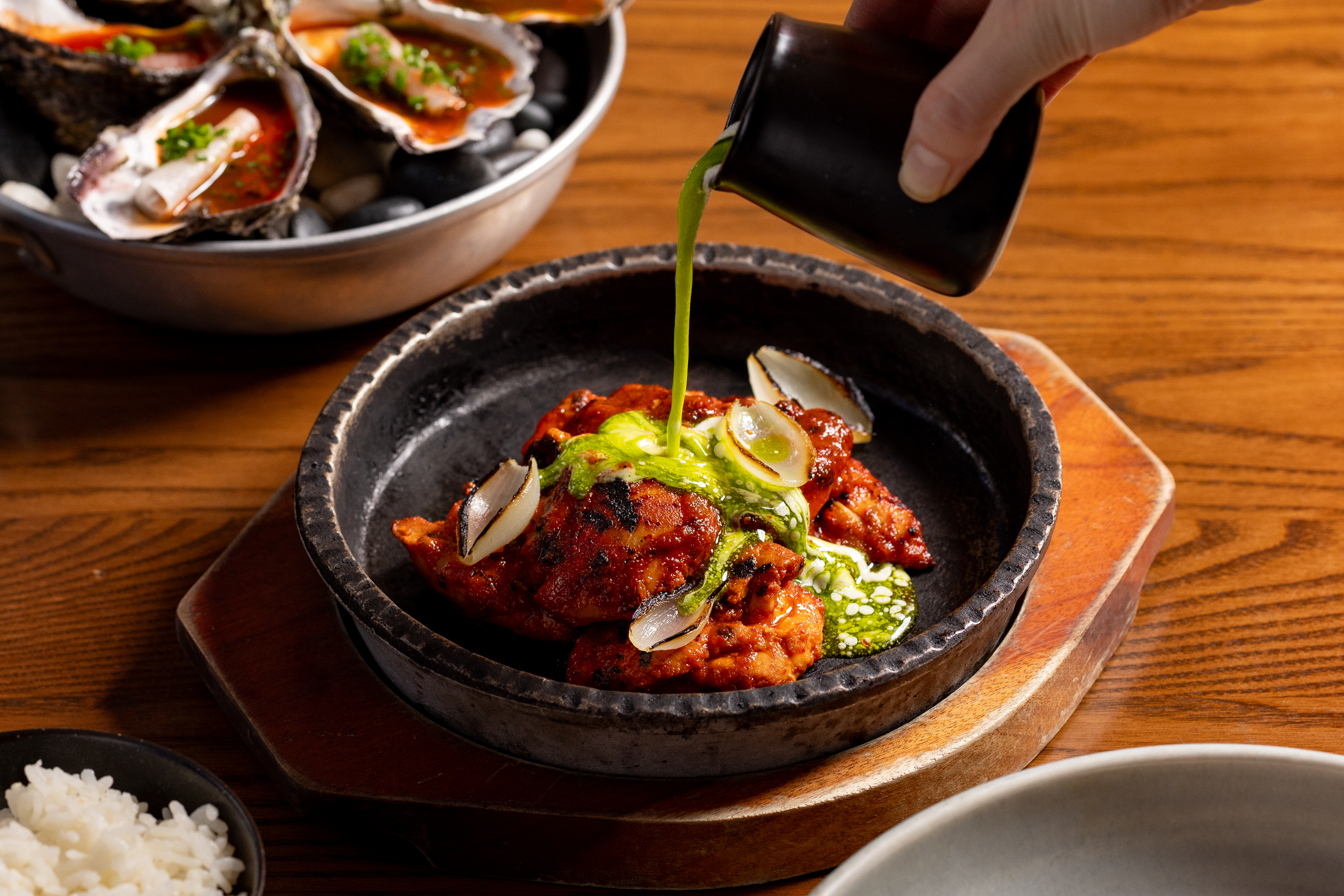 Oysters and chicken at Gochu. Photo / Babiche Martens