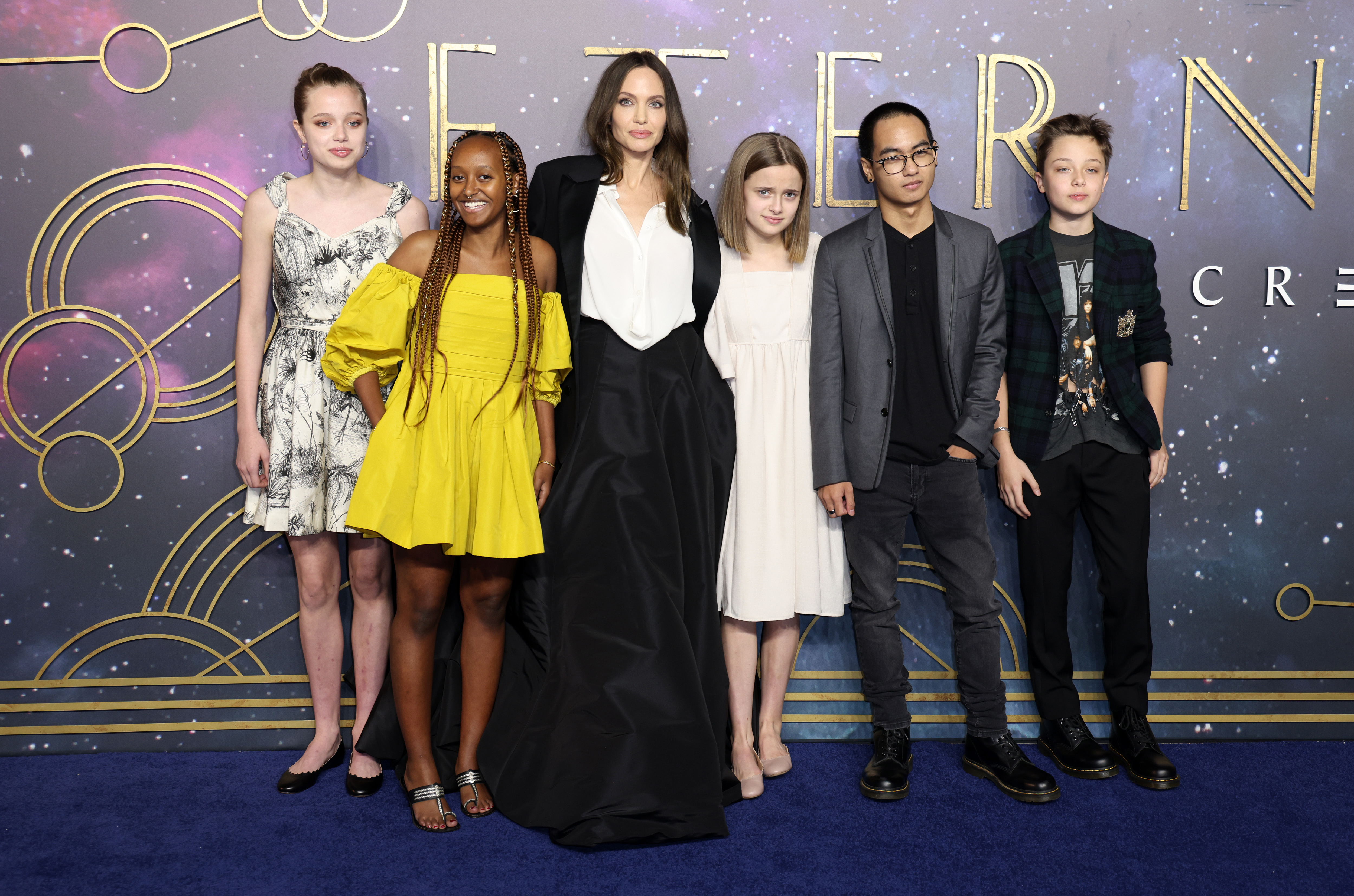 (L to R) Shiloh Jolie-Pitt, Zahara Jolie-Pitt, Angelina Jolie, Vivienne Jolie-Pitt, Maddox Jolie-Pitt and Knox Jolie-Pitt attend the 