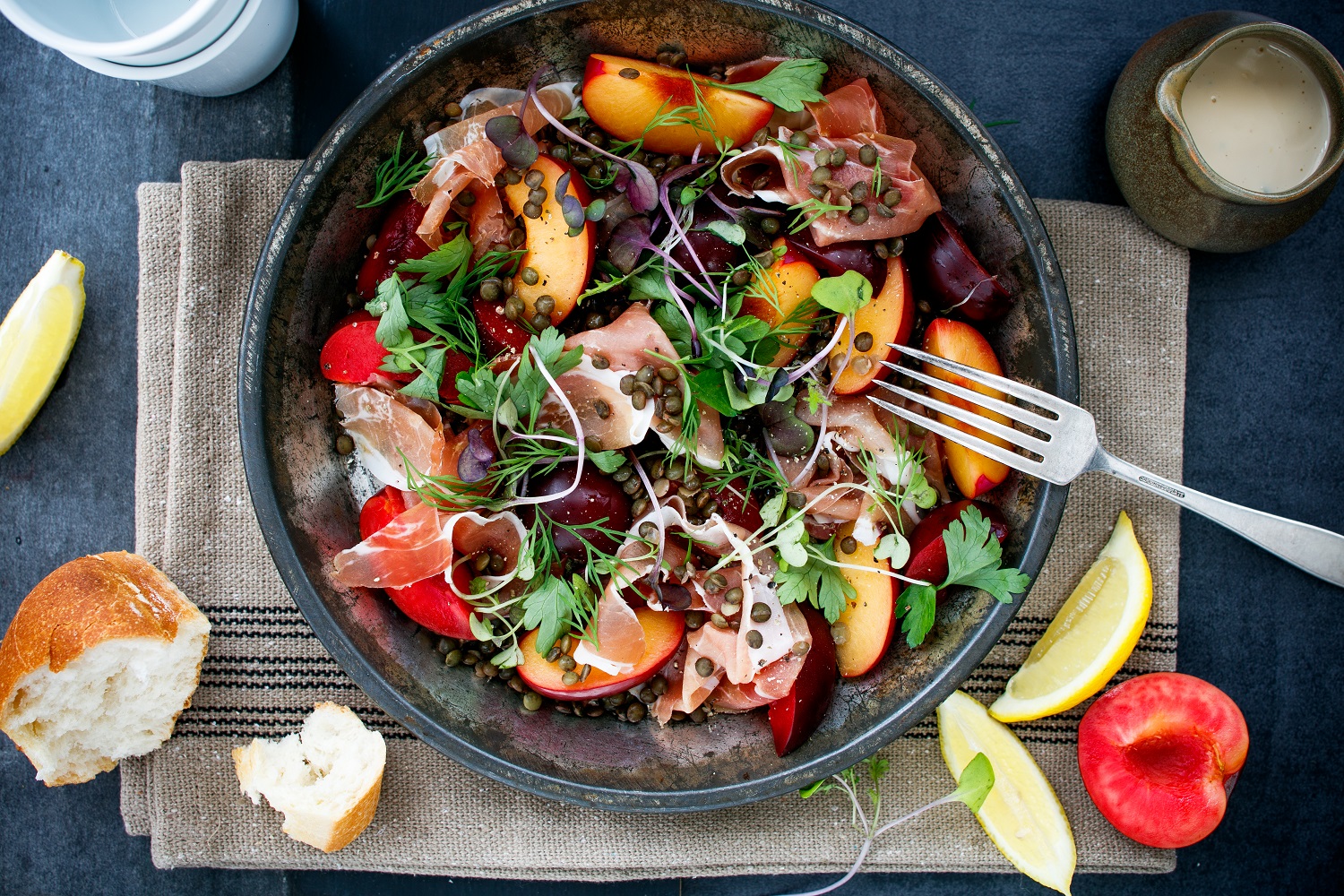 Lentil salad with prosciutto and plums. Photo / Babiche Martens