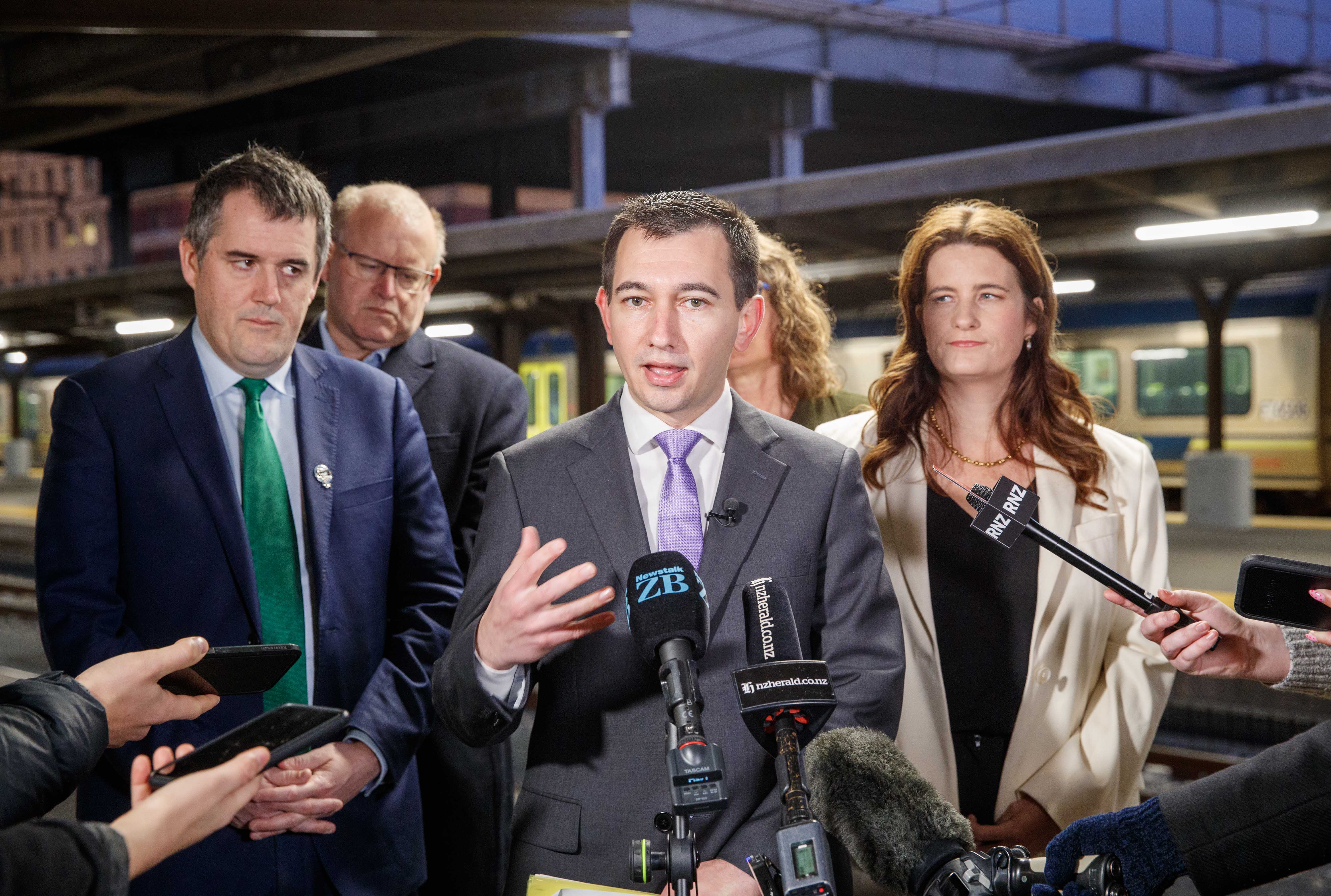 Transport Minister Simeon Brown, with, from left, Infrastructure Minister Chris Bishop, Greater Wellington Regional Council chairman Daran Ponter and Finance Minister Nicola Willis. Photo / Mark Mitchell