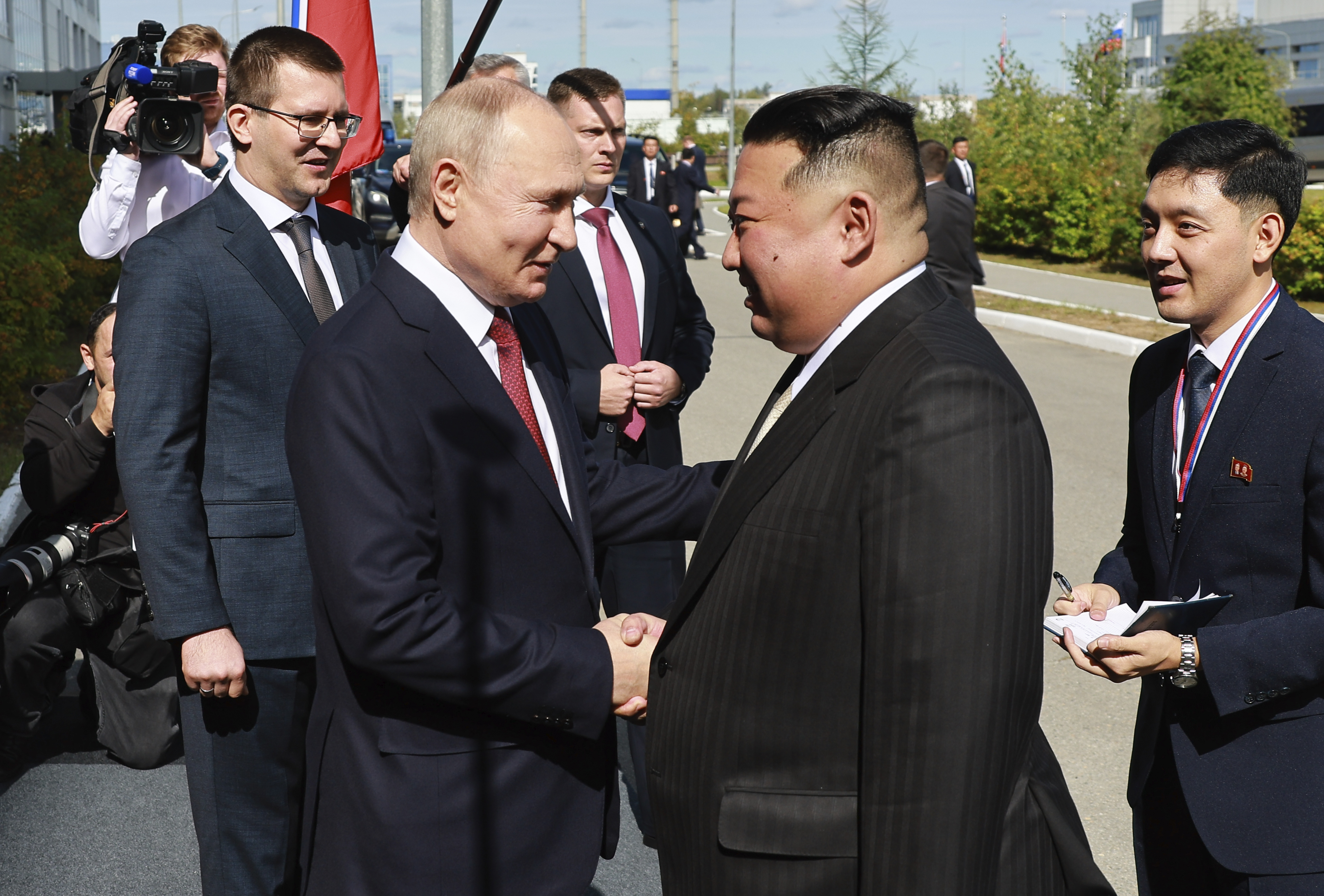 Russian President Vladimir Putin (left) and North Korea's leader Kim Jong Un shake hands during their meeting at the Vostochny cosmodrome outside the city of Tsiolkovsky. Photo / AP