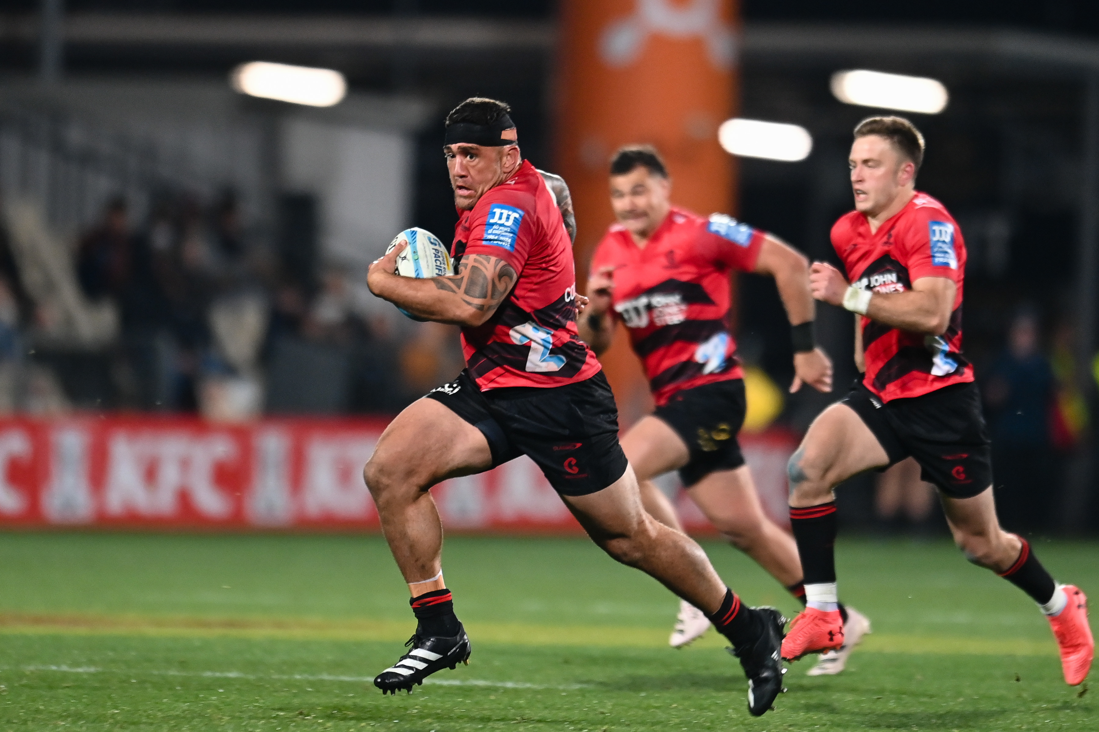 Codie Taylor on the charge against the Blues. Photo / Photosport