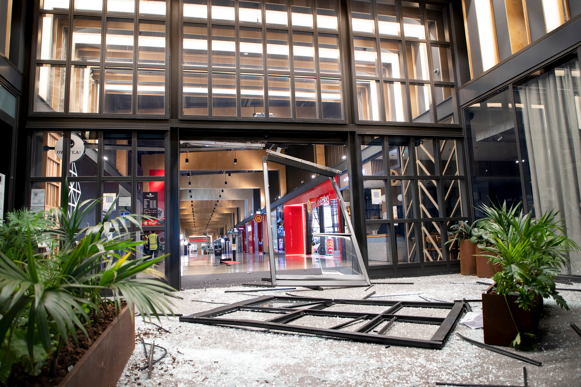 Damage done to the Ormiston Town Centre shopping mall when a group of about a dozen young people used cars to smash into the mall. Photo / Hayden Woodward