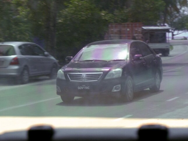 The crew were followed by a black government vehicle upon arrival to the country. Photo / 60 Minutes