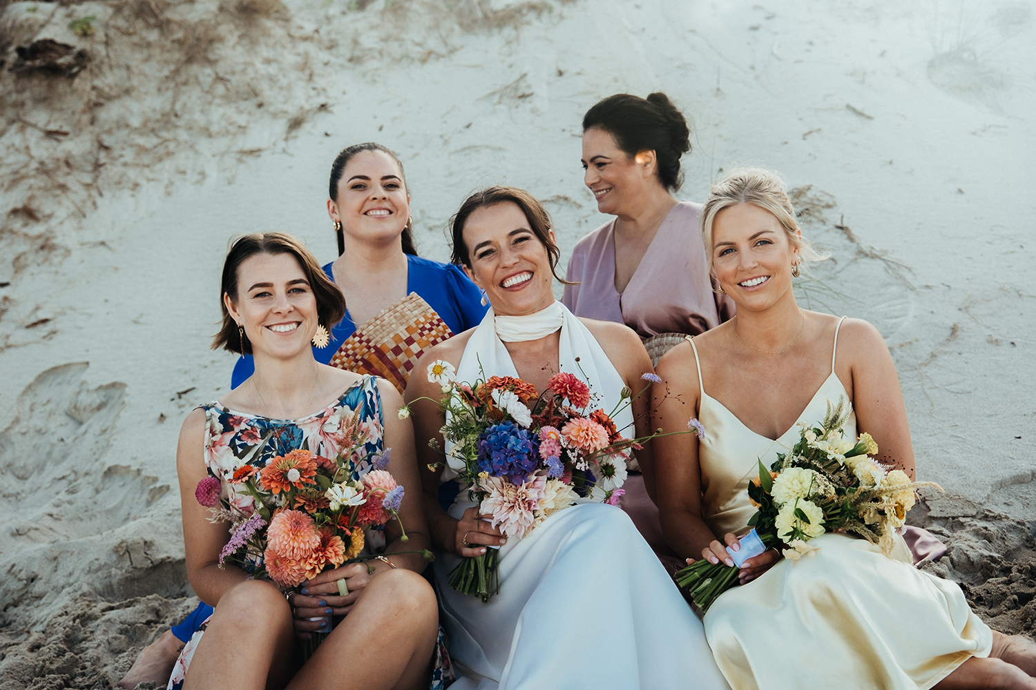 The bridal party carried bouquets and handwoven ili. Photo / Geoffery Matautia and Hele Ikimotu.