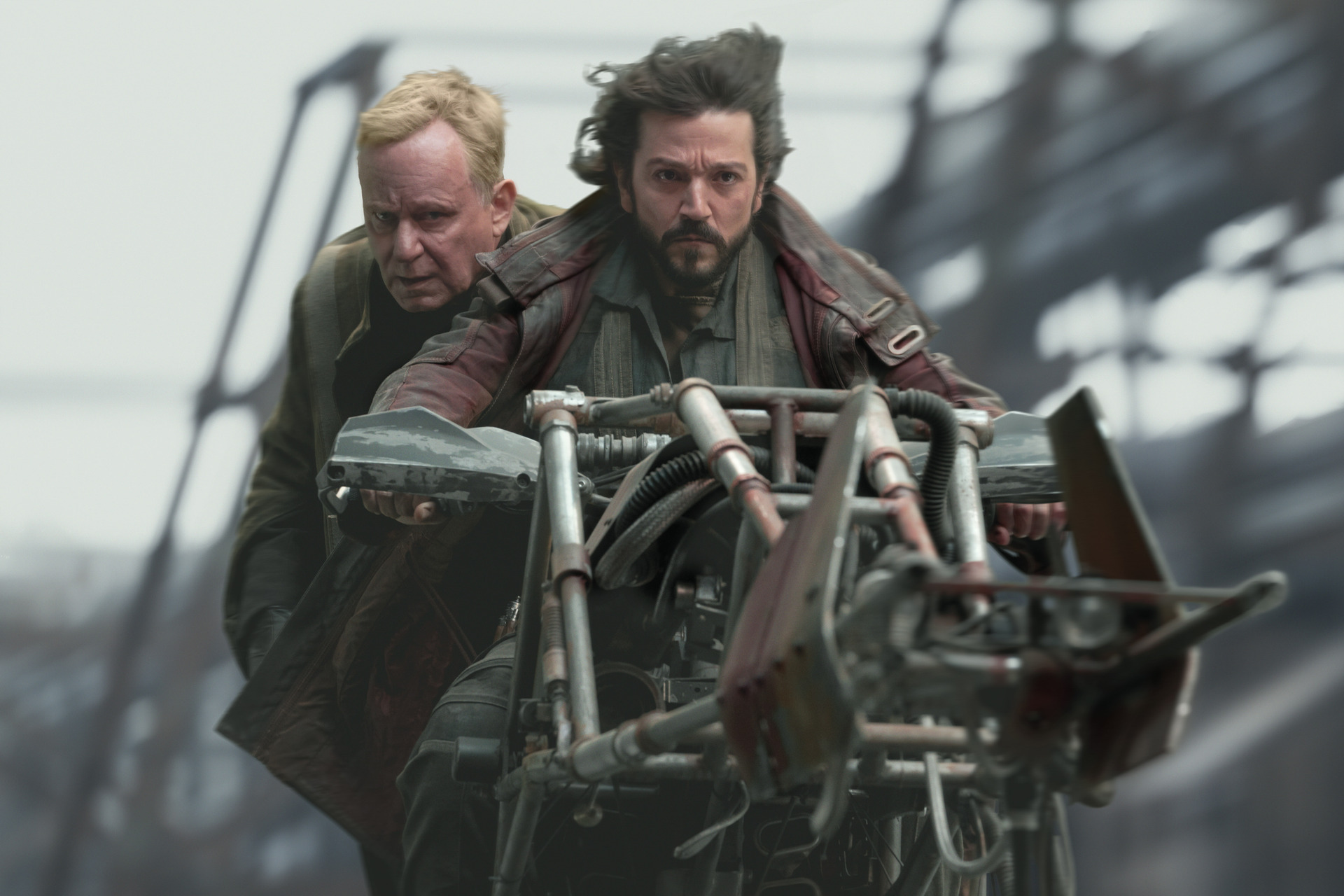 Luthen Rael (Stellan Skarsgard) and Cassian Andor (Diego Luna) make their escape in Andor. 