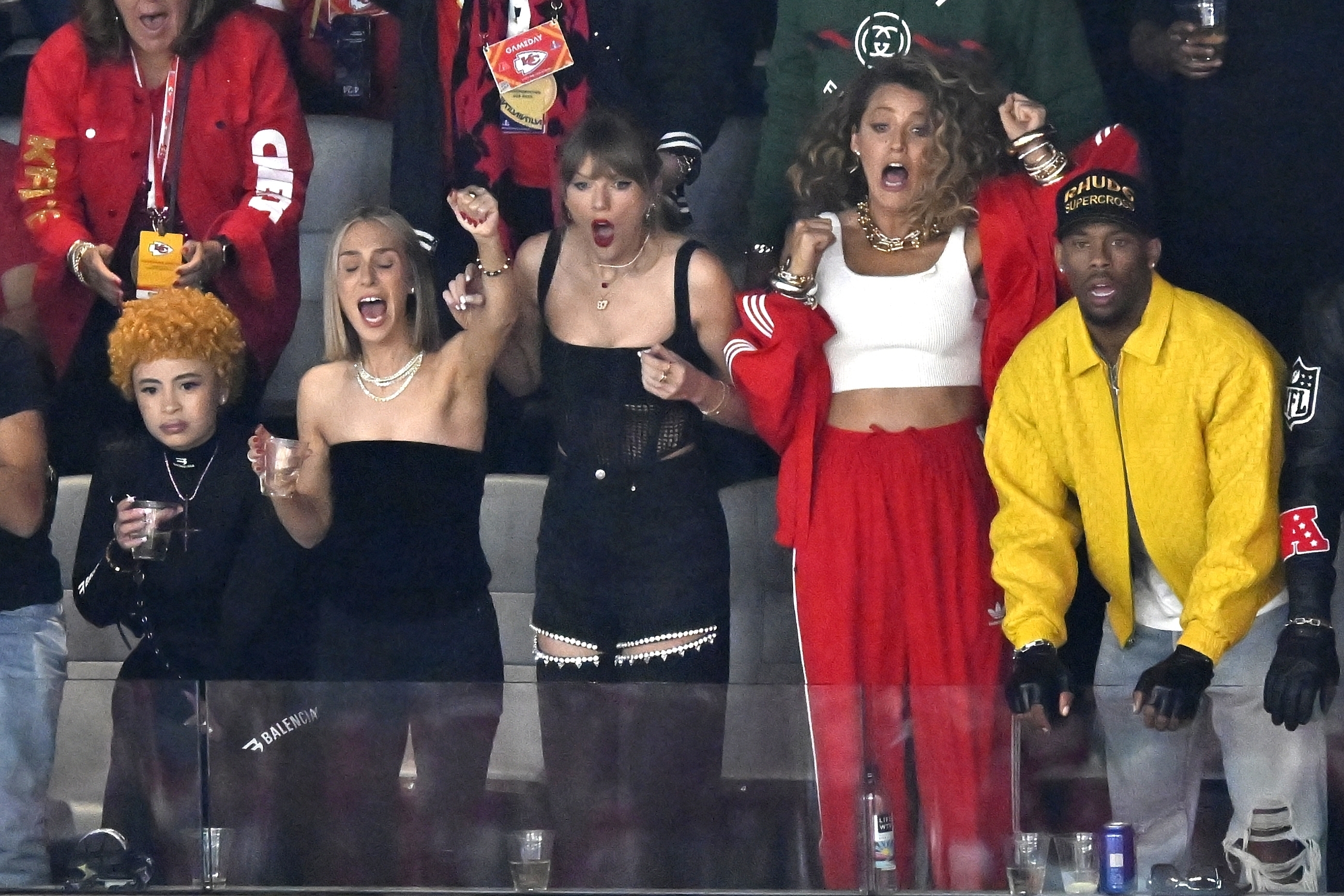Ice Spice, from left, Ashley Avignone, Taylor Swift and Blake Lively react during the first half of the NFL Super Bowl 58 football game between the San Francisco 49ers and the Kansas City Chiefs in Las Vegas. Photo / AP