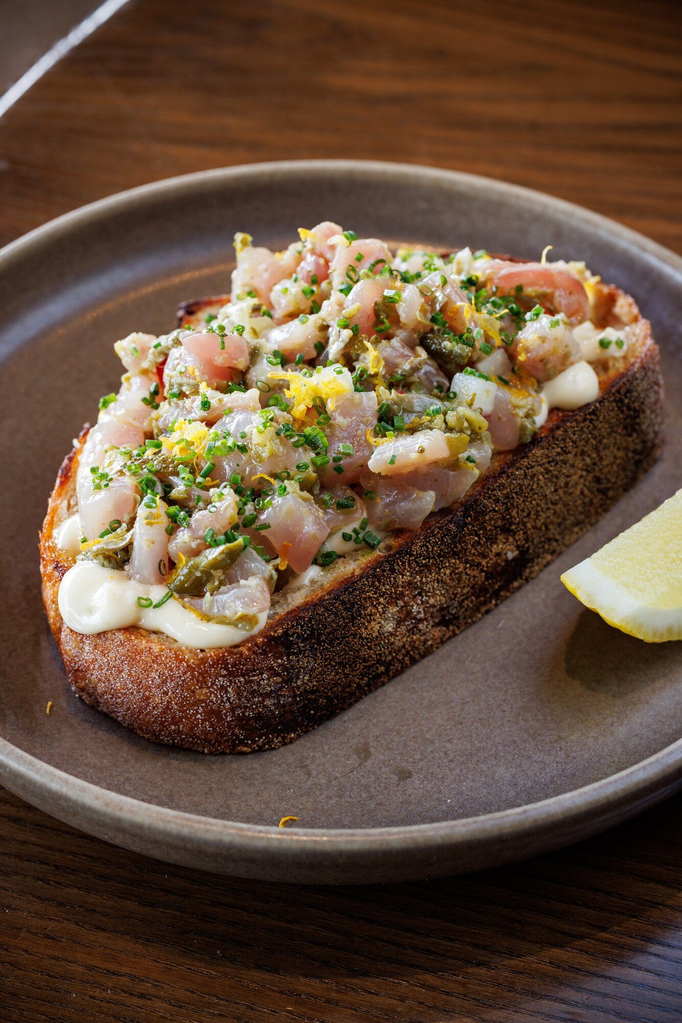 The raw fish on toast on the day menu at Duo. Photo / Babiche Martens