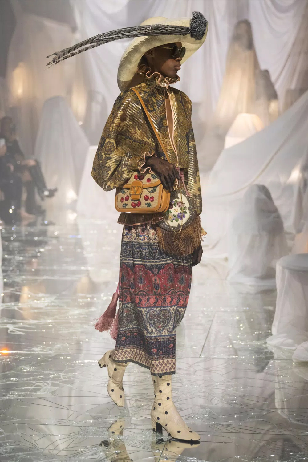 Accessories were on show on the Valentino runway, with models sporting hats, bags and fripperies of all kinds.