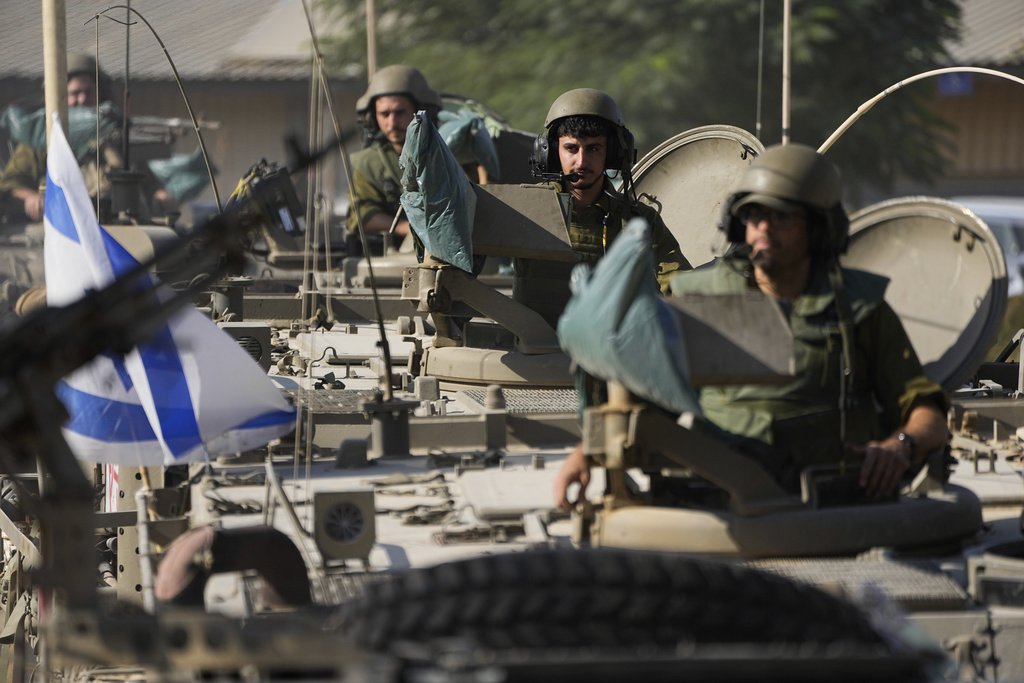 Israeli soldiers gather in a staging area near the border with Gaza Strip, in southern Israel on October 17. Photo / AP