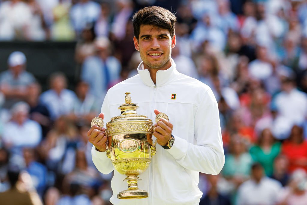 Carlos Alcaraz celebrates with the Gentleman's Singles Trophy after his victory over Novak Djokovic in the Wimbledon final. Photo / Getty Images