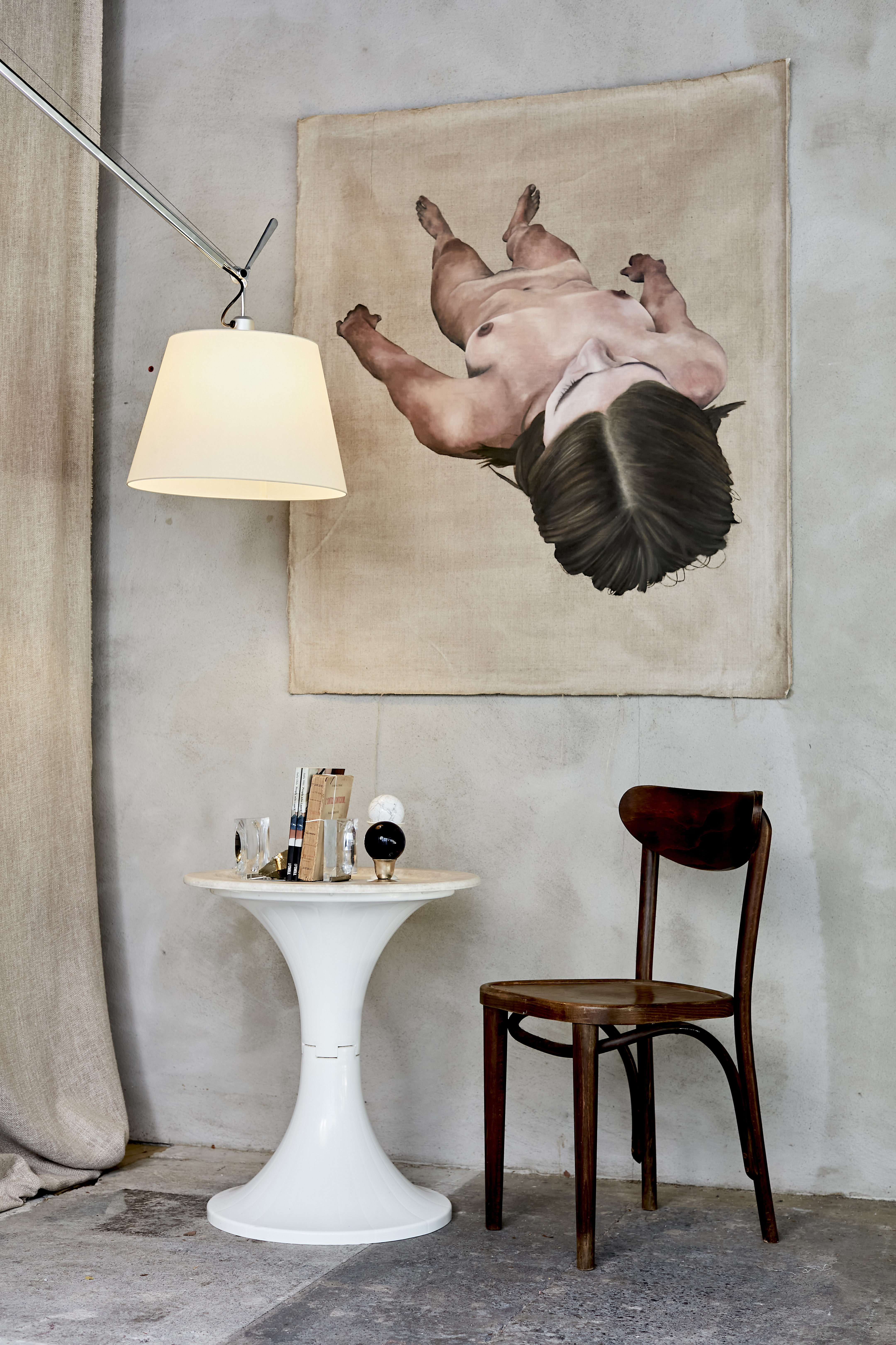 An oil on linen by local artist Sharon Duymel, vintage Tulip table, marble bookends and a pre-loved Bentwood chair at My Exhibition. Photo / Babiche Martens