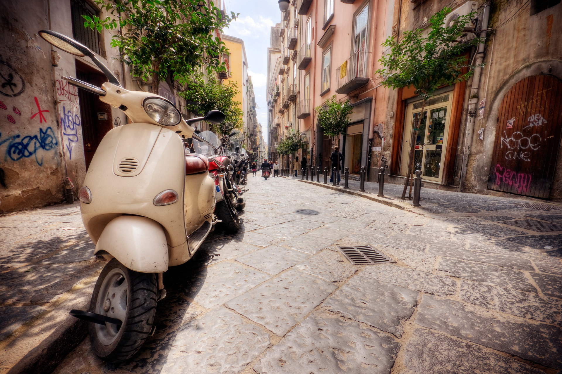 Vespas reign supreme in the narrow streets of the city's old quarter. Photo / Getty Images