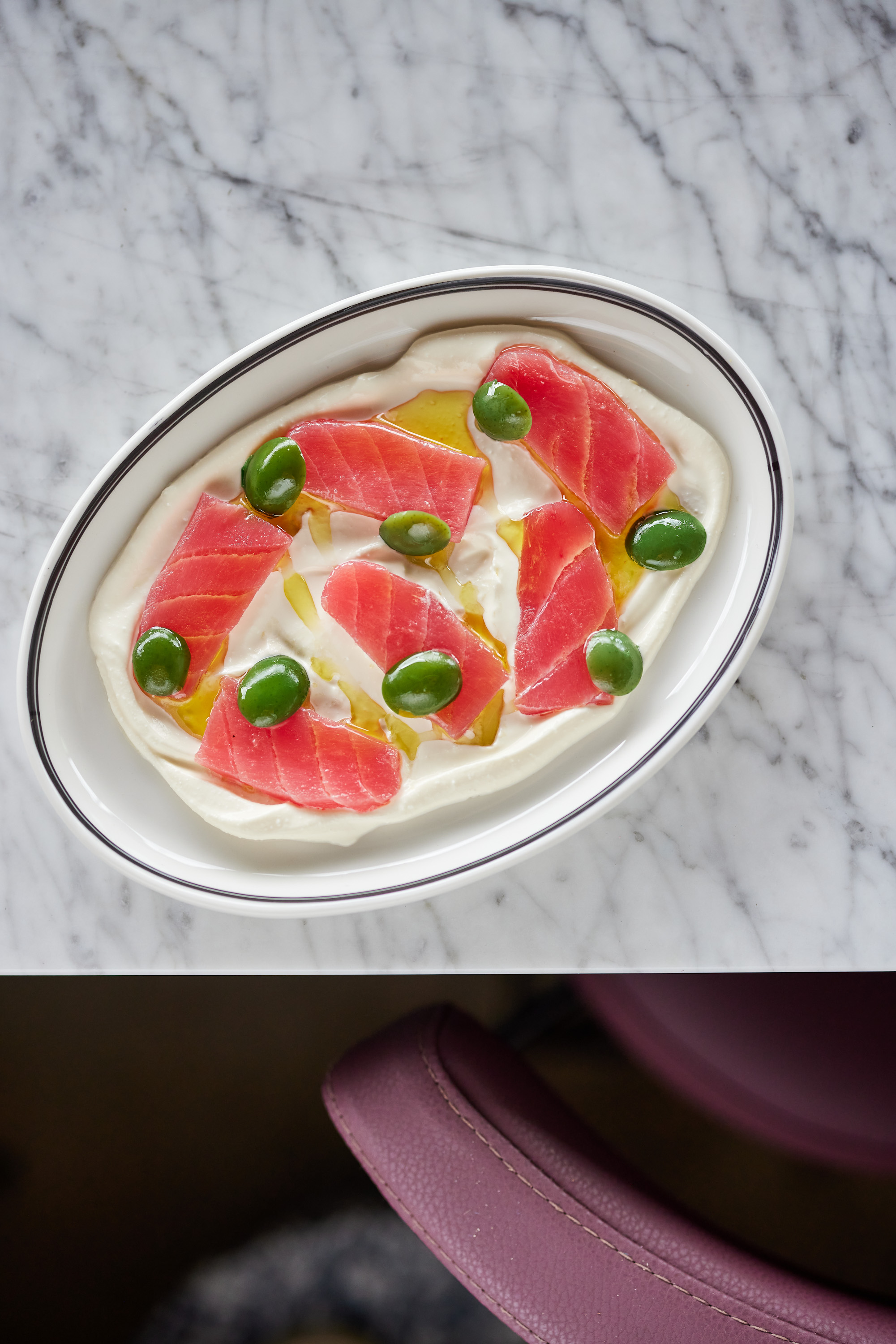 Tuna crudo with buffalo curd and Sicilian olives. Photo / Babiche Martens