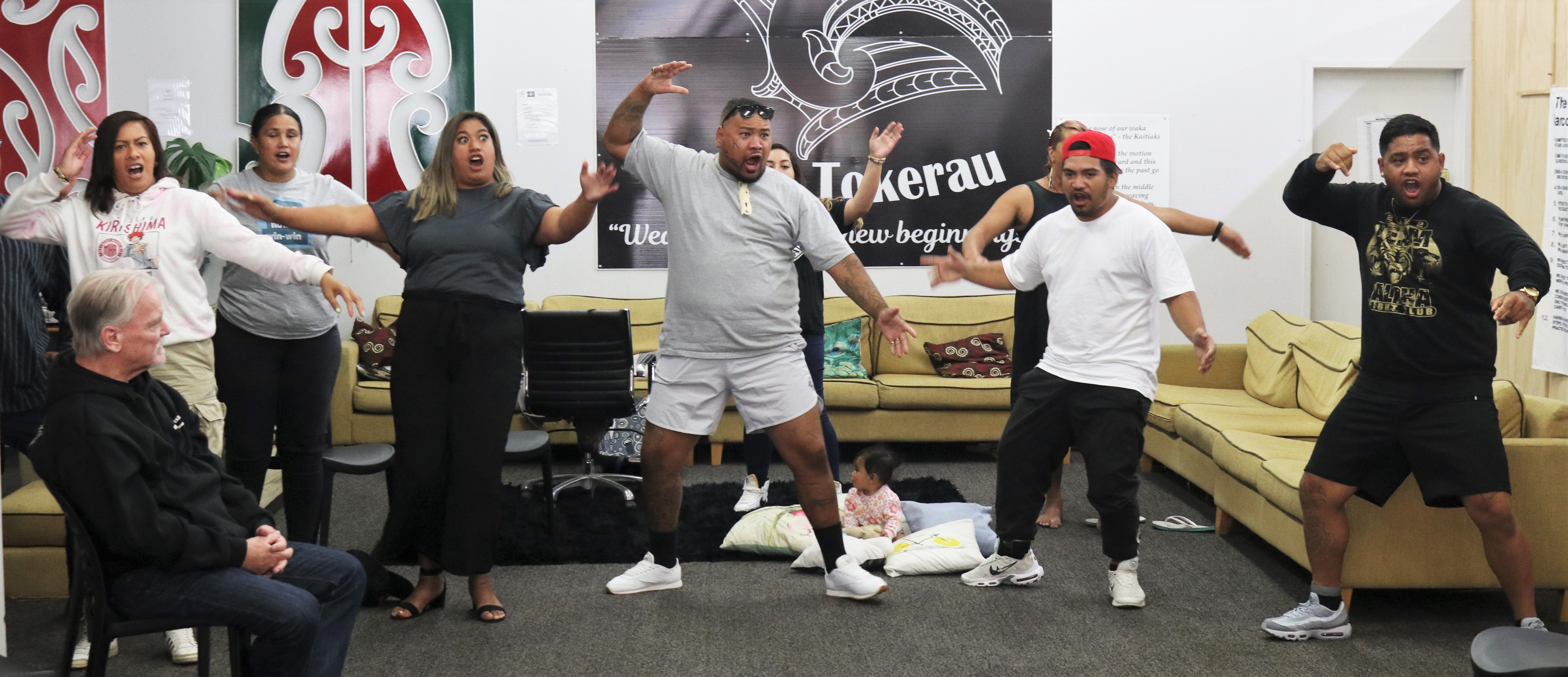 Staff and clients of Whakaoranga Whānau Recovery Hub perform a haka for Associate Health Minister Peeni Henare. Photo / Peter de Graaf