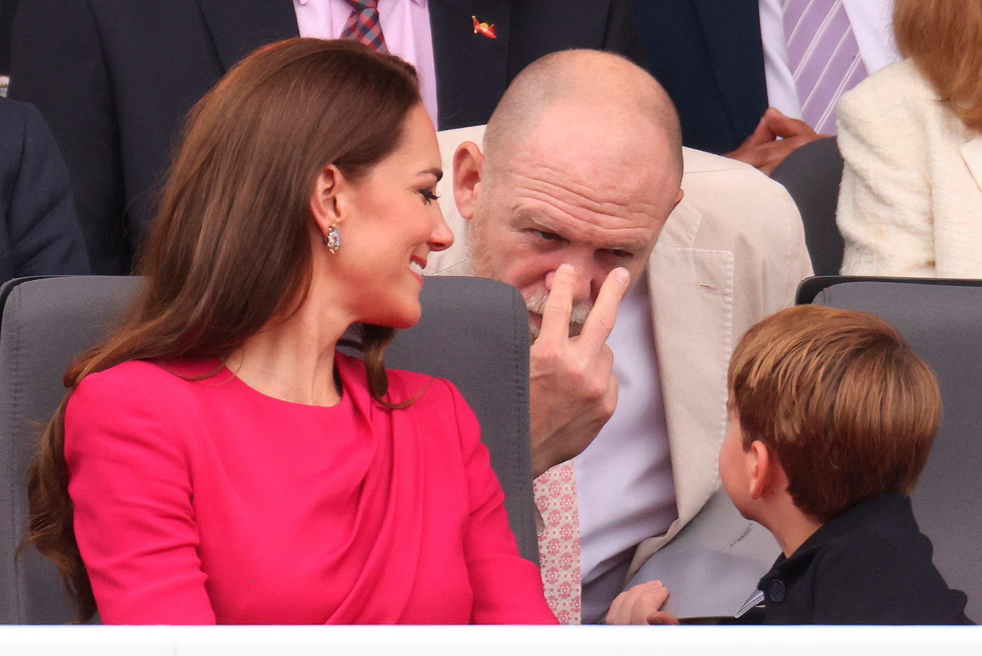 Mike Tindall gestures towards Prince Louis during the Platinum Jubilee Pageant outside Buckingham Palace in London. Photo / AP