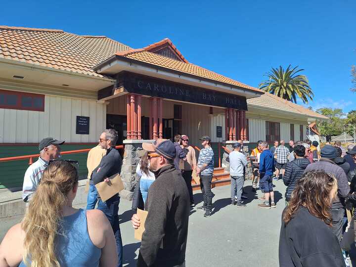 Workers leave a meeting in Timaru where it was confirmed jobs are to be cut at the Alliance Smithfield meatworks plant. Photo / Ben Tomsett
