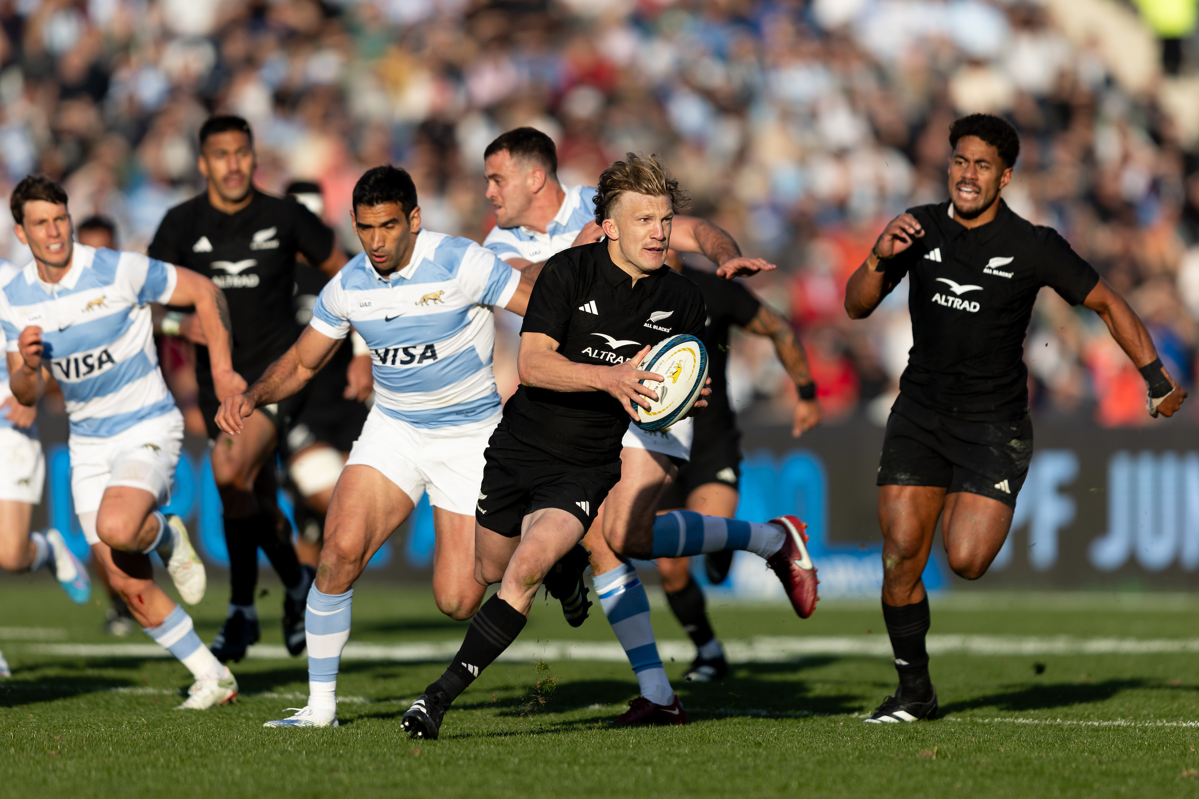 Damian McKenzie runs with the ball. Photo / Photosport.co.nz