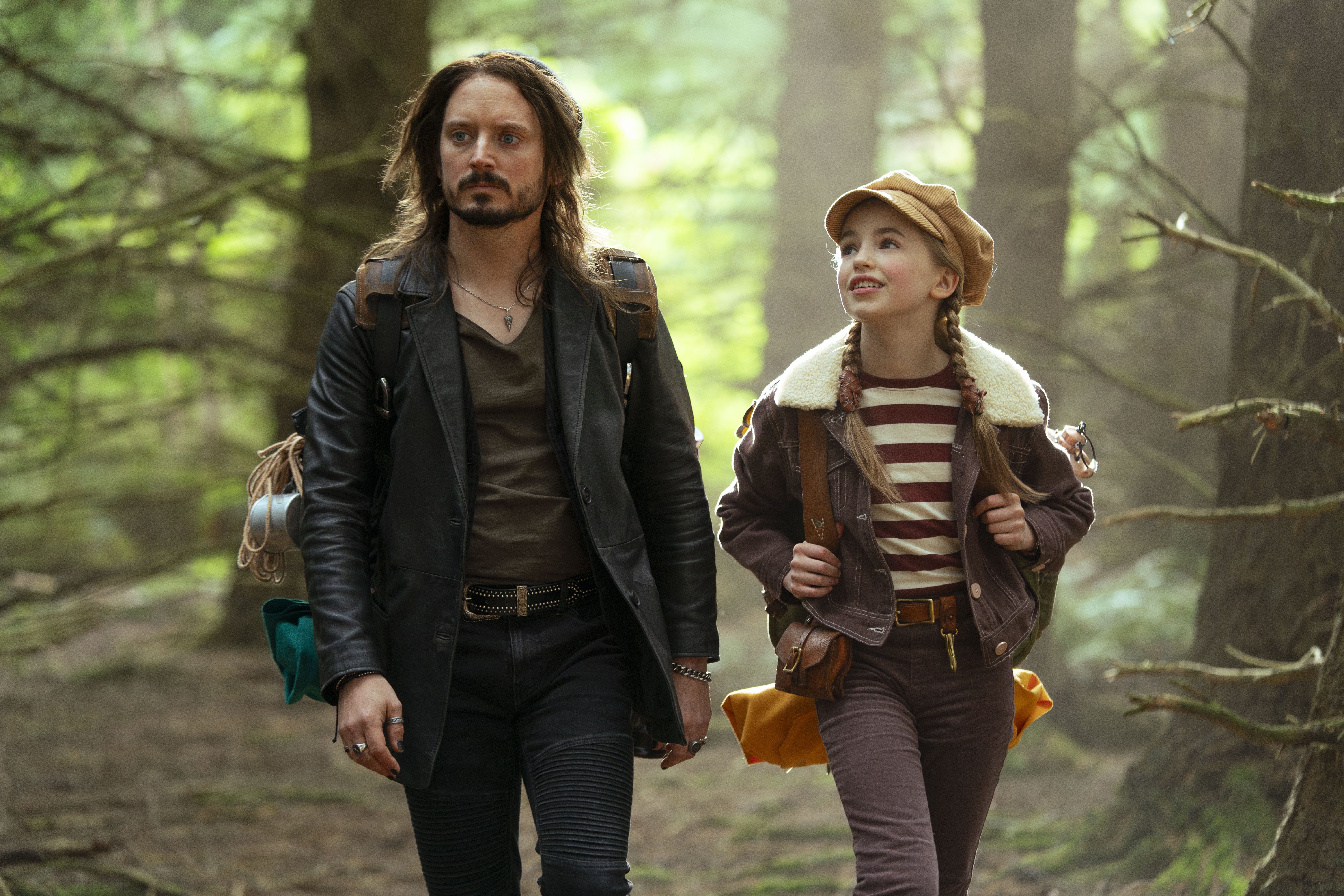Nell Fisher and Elijah Wood in the movie Bookworm.