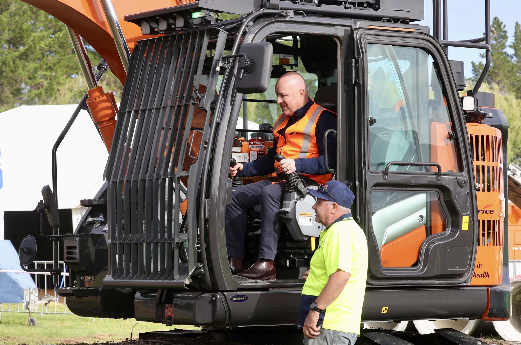 Prime Minister Christopher Luxon behind the wheel of an excavator at Field Days in Feilding. Photo / Mark Mitchell