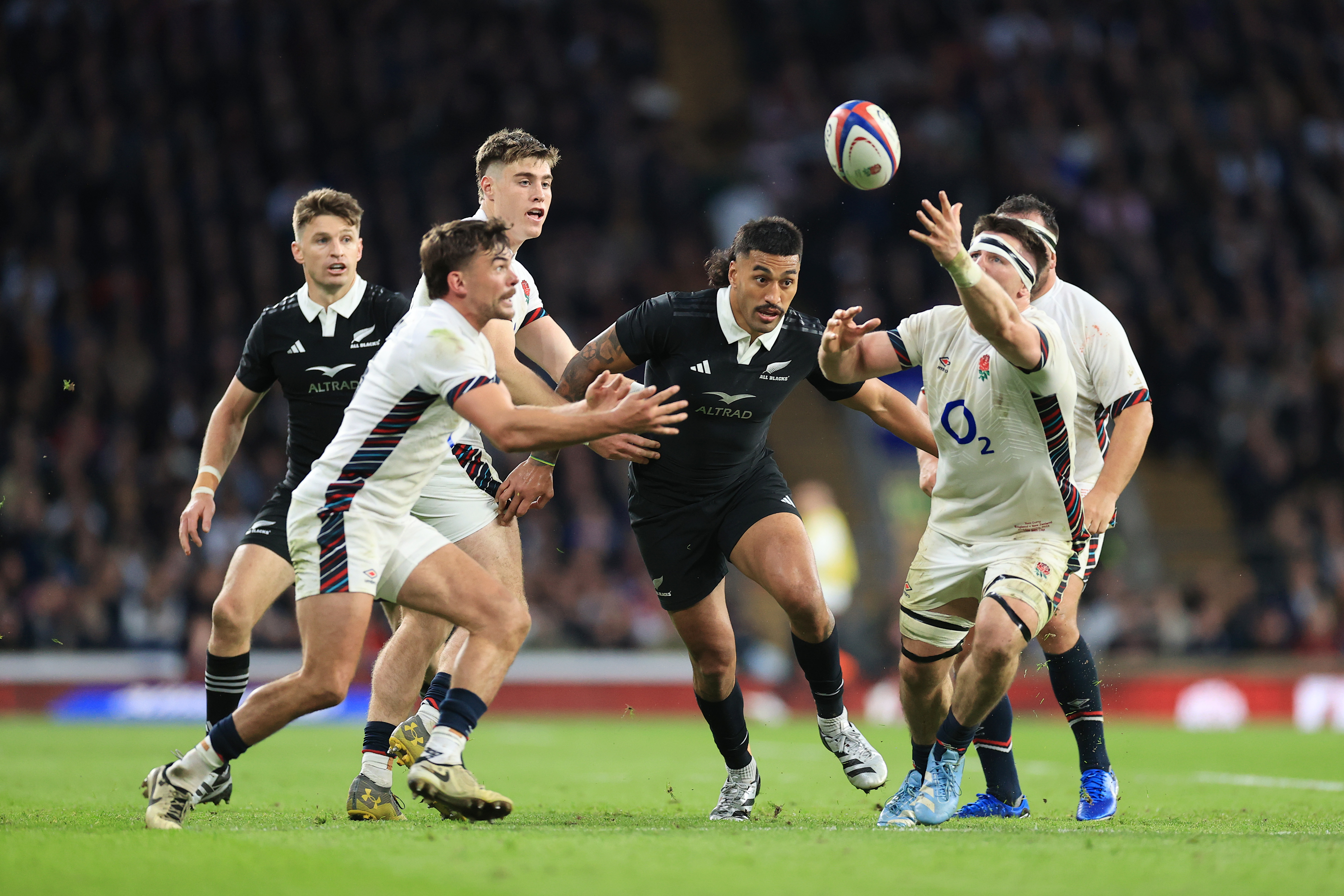 Rieko Ioane battles with George Furbank and Tom Curry at Twickenham. Photo / Photosport