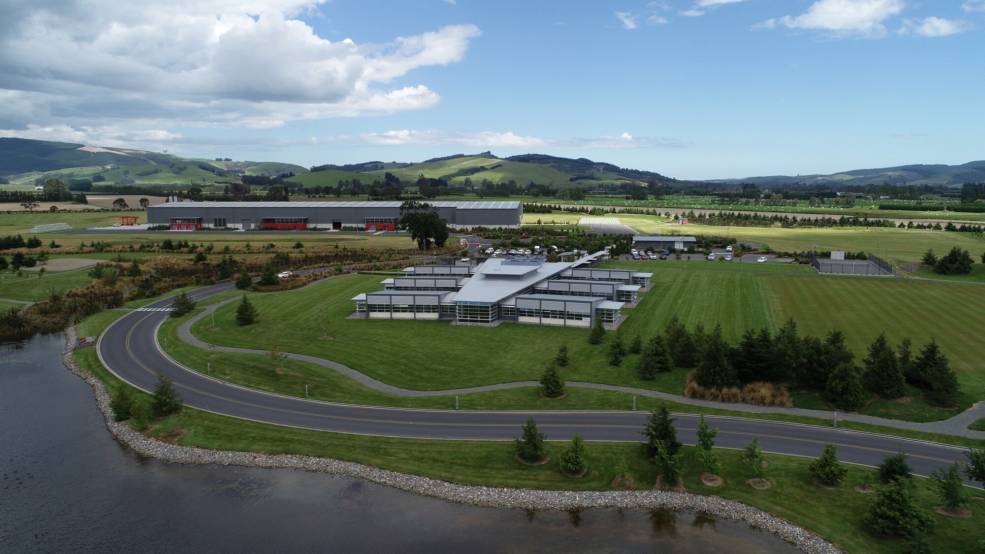 Calder Stewart's award-winning national head office (centre) with its steel factory in the background. This is at Revolution Hills outside Milton, Otago. Photo / Calder Stewart