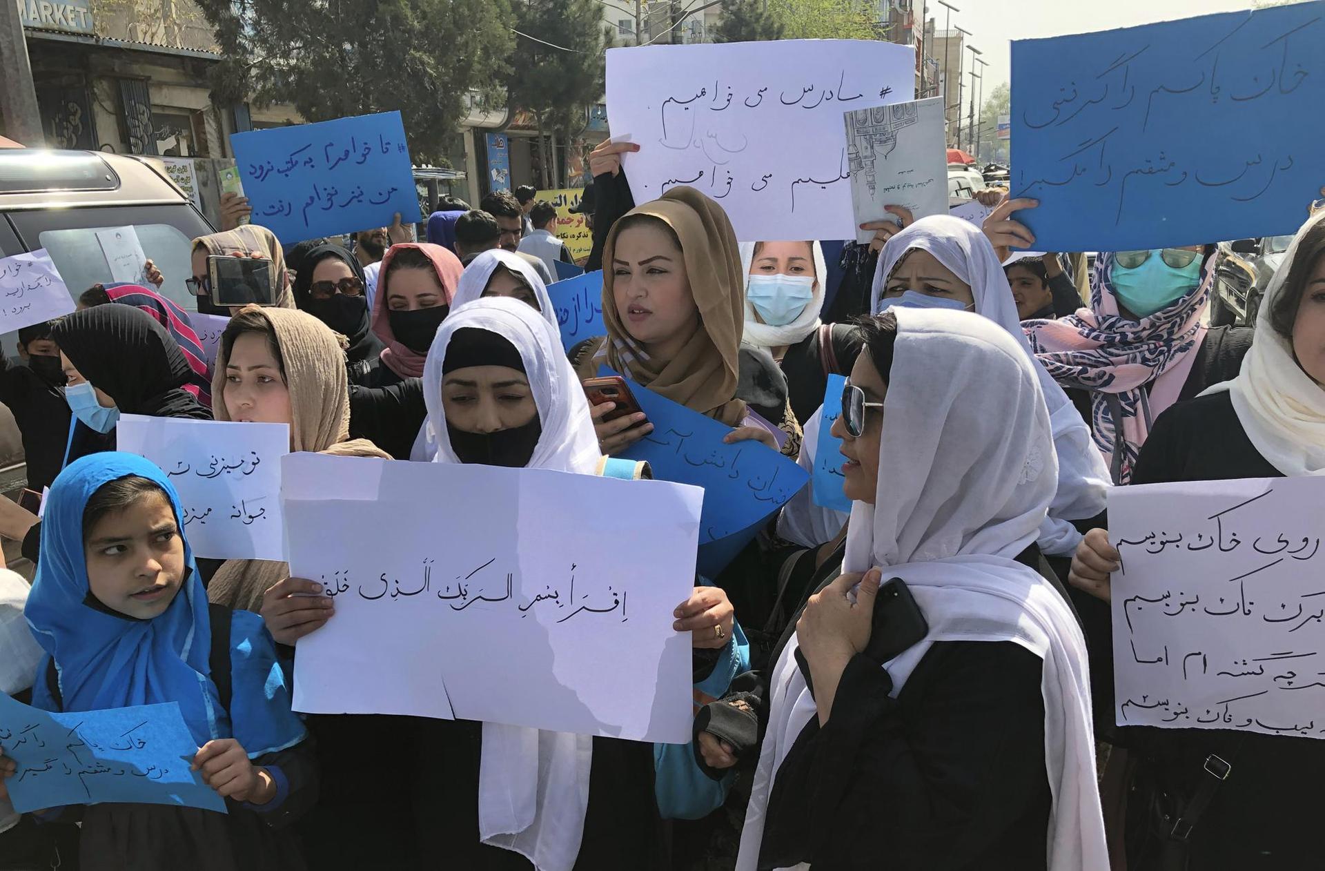 fghan women chant and hold signs of protest during a demonstration in Kabul, Afghanistan, Saturday, March 26, 2022. Photo / AP 