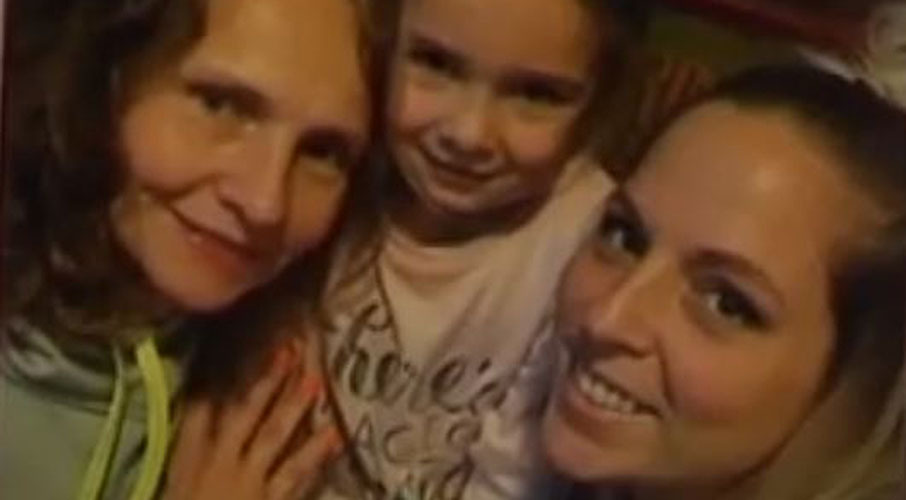 Hillary (far right, with Dawn and daughter Stella) had spent years trying to track down her half-sibling Dawn. Photo / Fox 8

