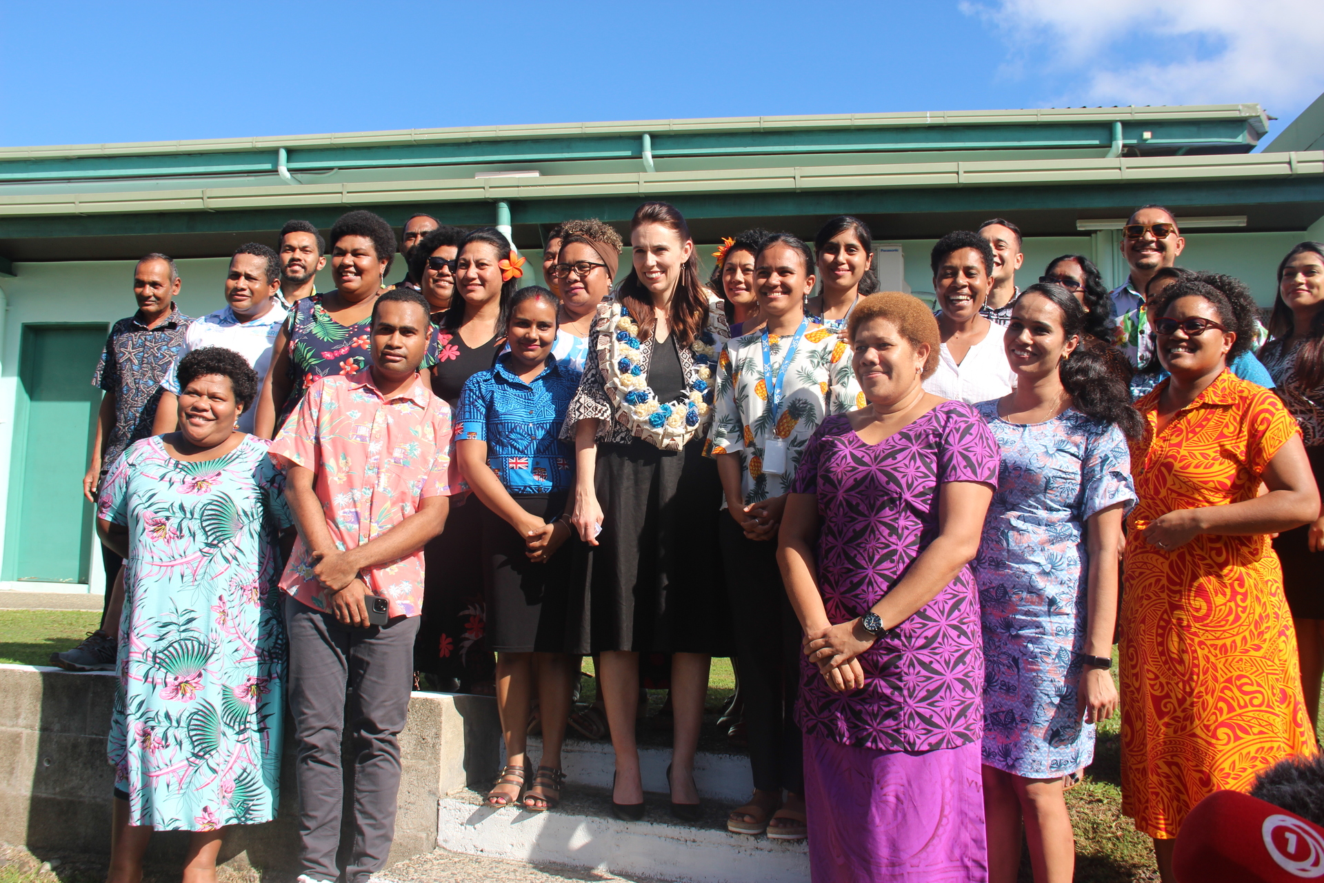 PM Jacinda Ardern with staff at Centre for Pacific Crops and Trees (CePaCT) in Suva, to which the Government has donated $10m as part of climate change finance. Photo / Michael Neilson