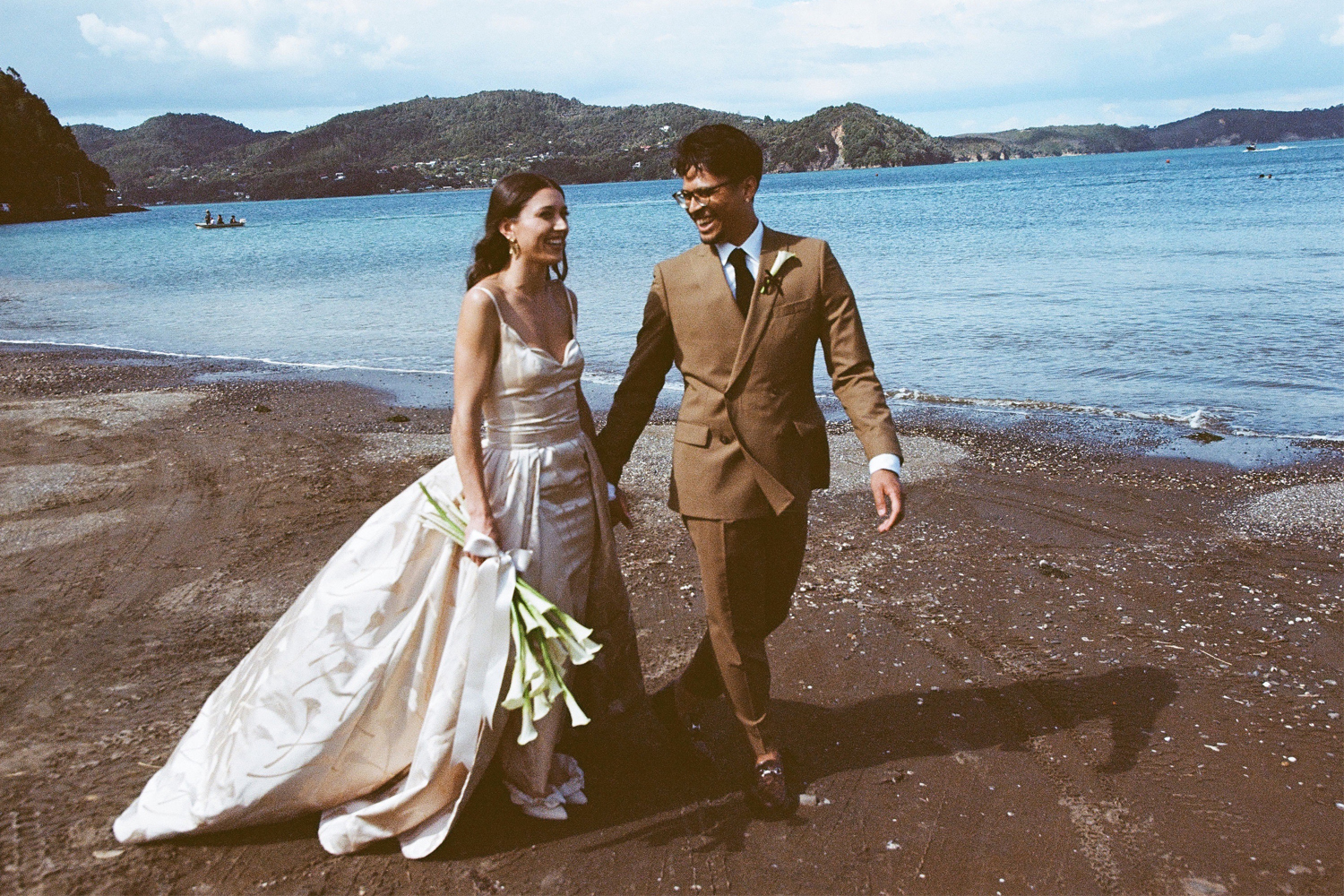 Little Huia provided a picturesque backdrop for the couple’s wedding shoot. Photo / Jonny Scott