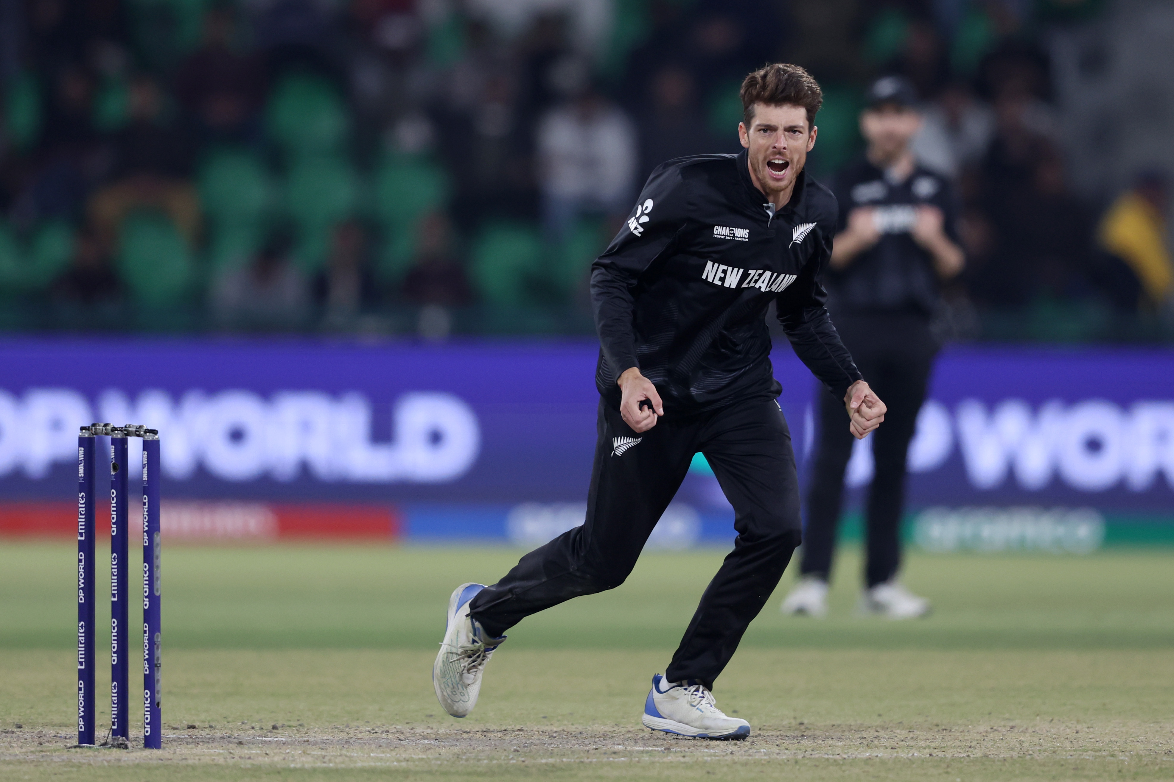 Mitchell Santner celebrates a wicket in the ICC Champions Trophy 2025 semifinal between South Africa and New Zealand. Photo / Getty Images