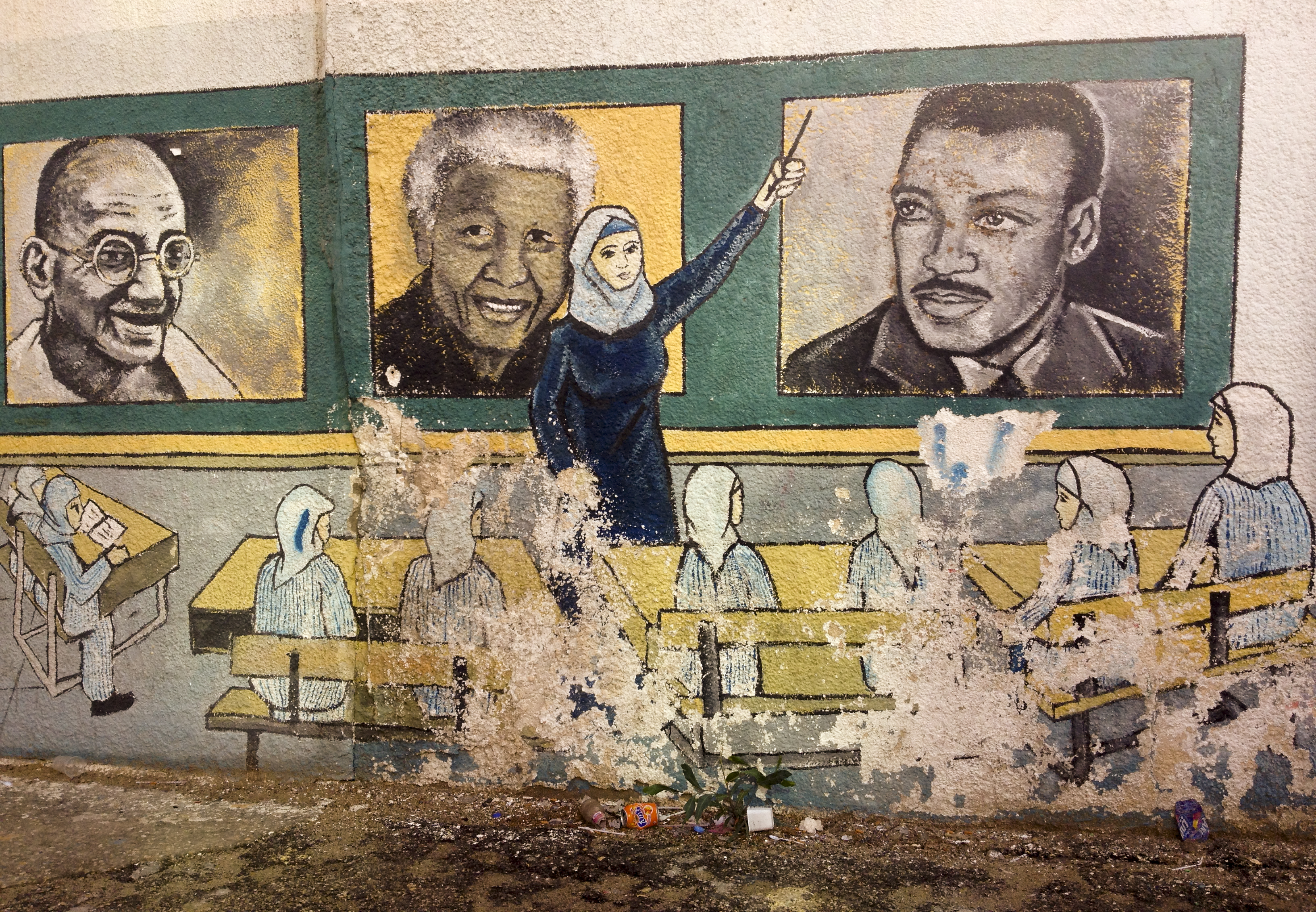 Mural on the wall of one of the universities in Gaza City featuring Nelson Mandela - learning about international heroes for social justice. Photo/Roger Fowler. 