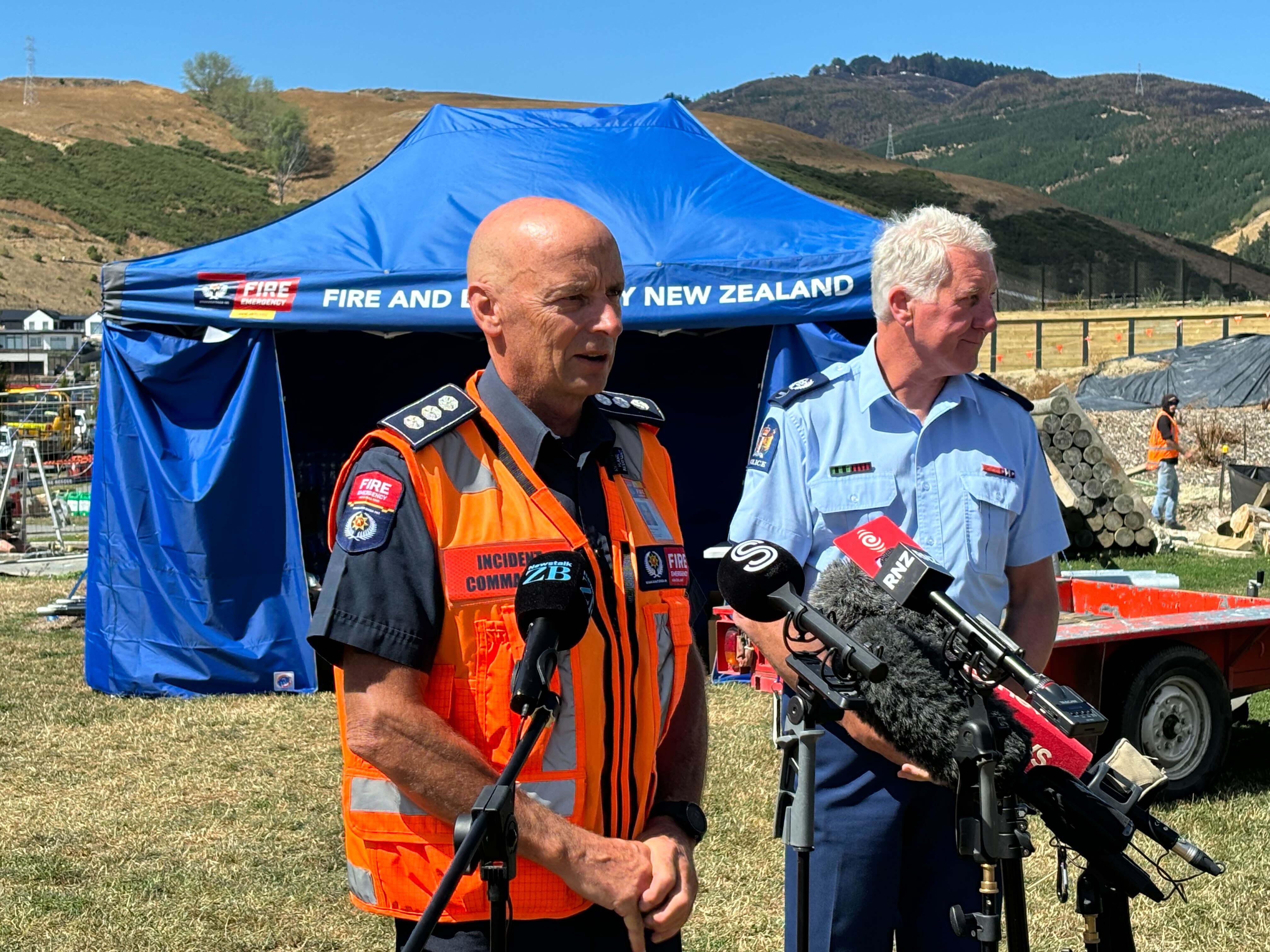 Senior Sergeant Roy Appley and Fire and Emergency Incident controller Steve Kennedy provide media with an update on the Port Hills fire. Photo / Jaime Cunningham