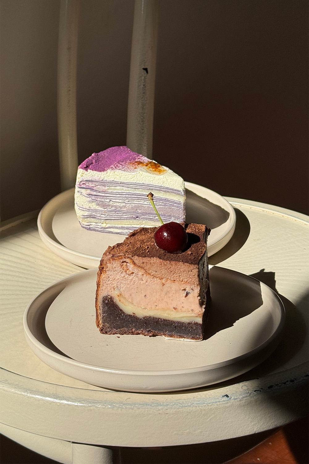 From danishes to doughnuts and fermented loaves, Auckland bakeries present their best servings, like this crepe cake and mochi-filled chocolate cheesecake from Fankery.