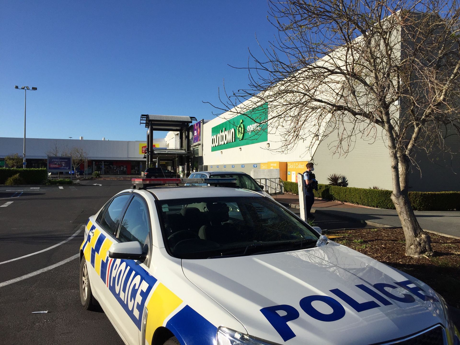 Police at the New Lynn Countdown after the attack yesterday afternoon. Photo / NZH