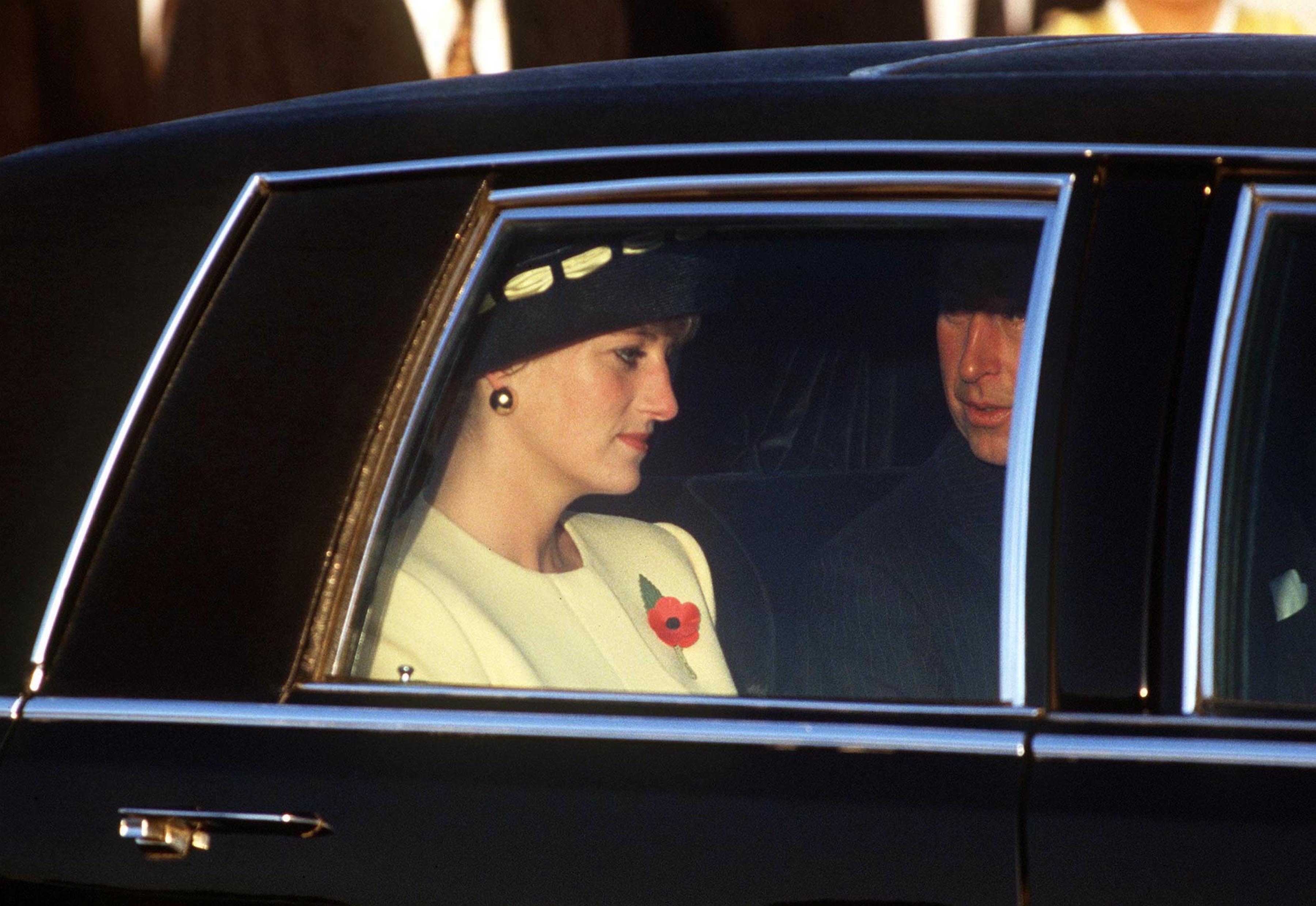The Prince and Princess of Wales look unhappy as they arrive in Seoul during an official visit to South Korea, November 1992. Photo / Getty Images