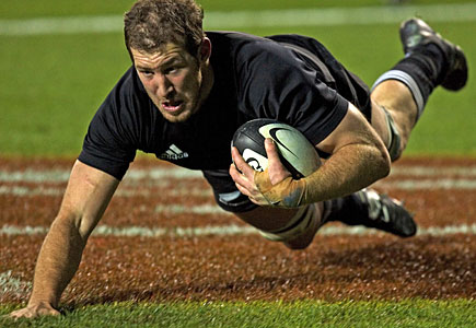Chris Jack runs in a try for the All Blacks. Photo / Paul Estcourt
