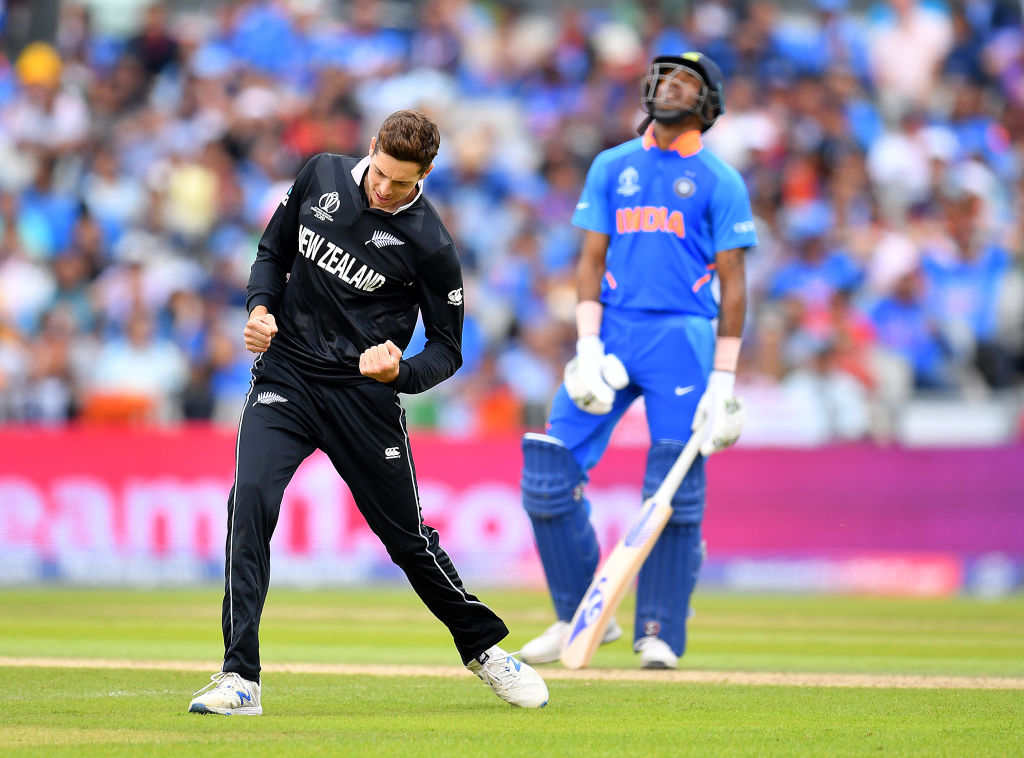 Mitchell Santner of New Zealand celebrates dismissing Rishbh Pant. Photo /Getty