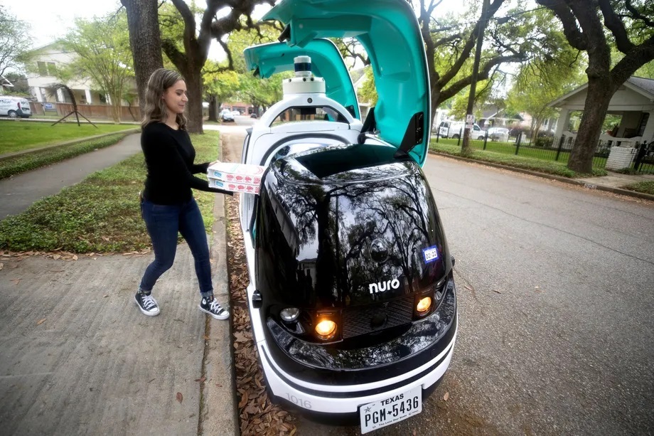 A Nuro driverless vehicle being used by Dominos in July 2021 during a trial in Texas. The firm let customers make pre-paid orders from its Woodland Heights store in Houston, on certain days and times, have their pizza delivered to them by a self-driving Nuro R2 robot. Photo / Supplied