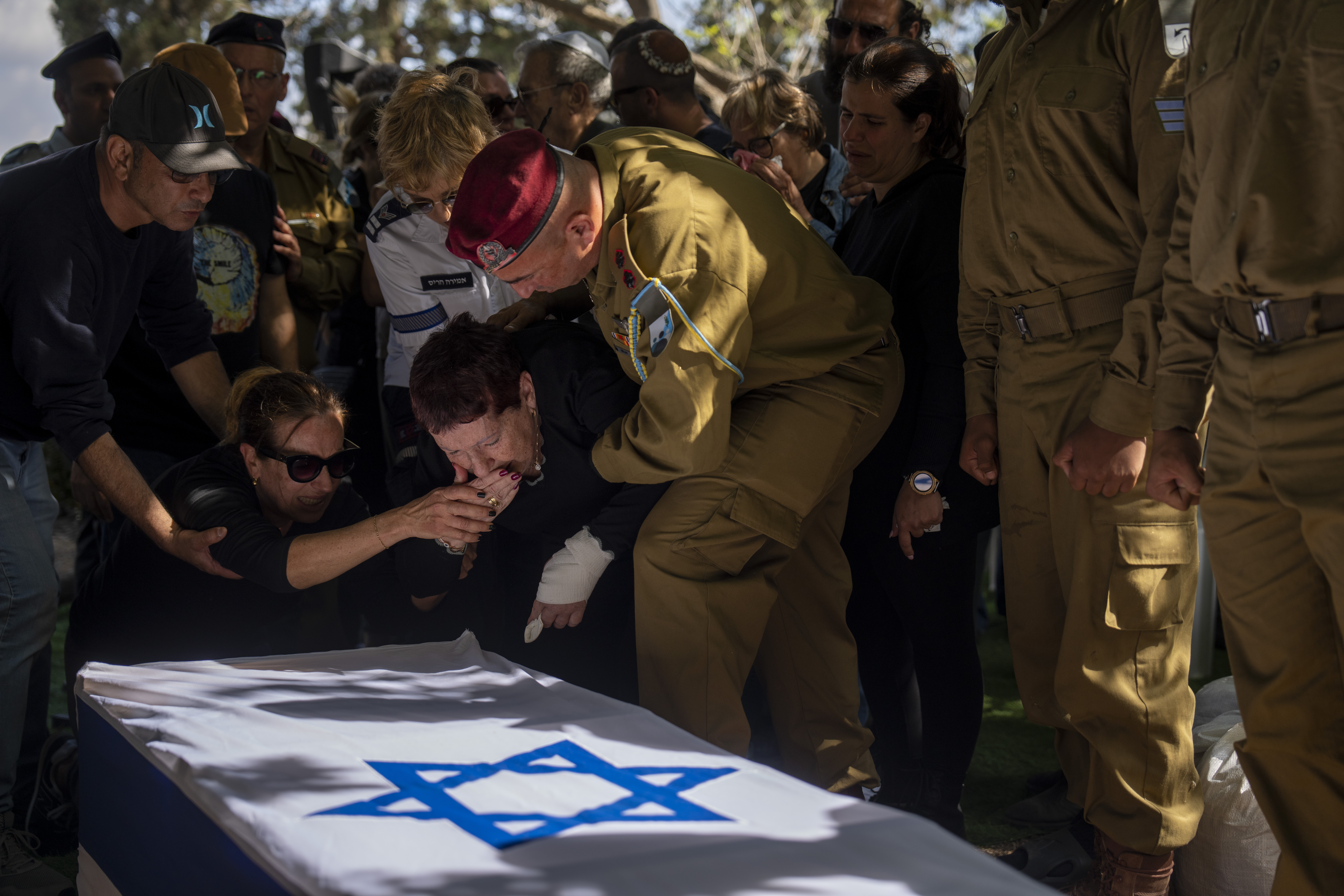 Family of Israeli solider Sergeant Reef Harush mourn in grief during his funeral in Ramat David, Israel. Photo / AP